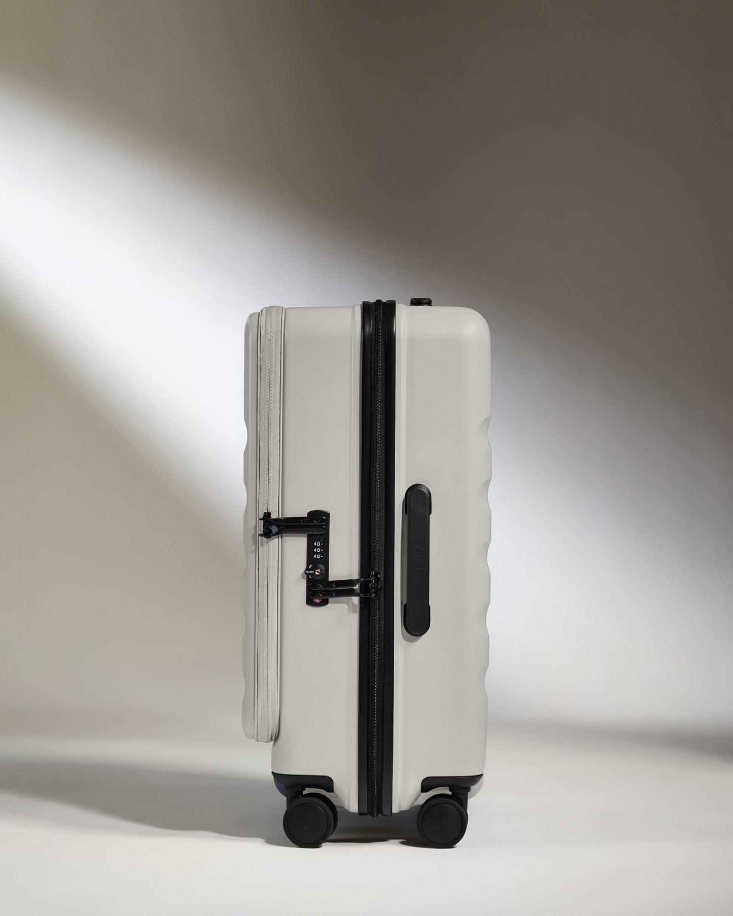 Antler Luggage -  Dual Opening Medium Suitcase in Taupe - Icon Stripe - Expanding Rollercase | Medium 4W Dual Opening Medium Suitcase in Neutral - Icon Stripe | Lightweight & Hard Shell Suitcase