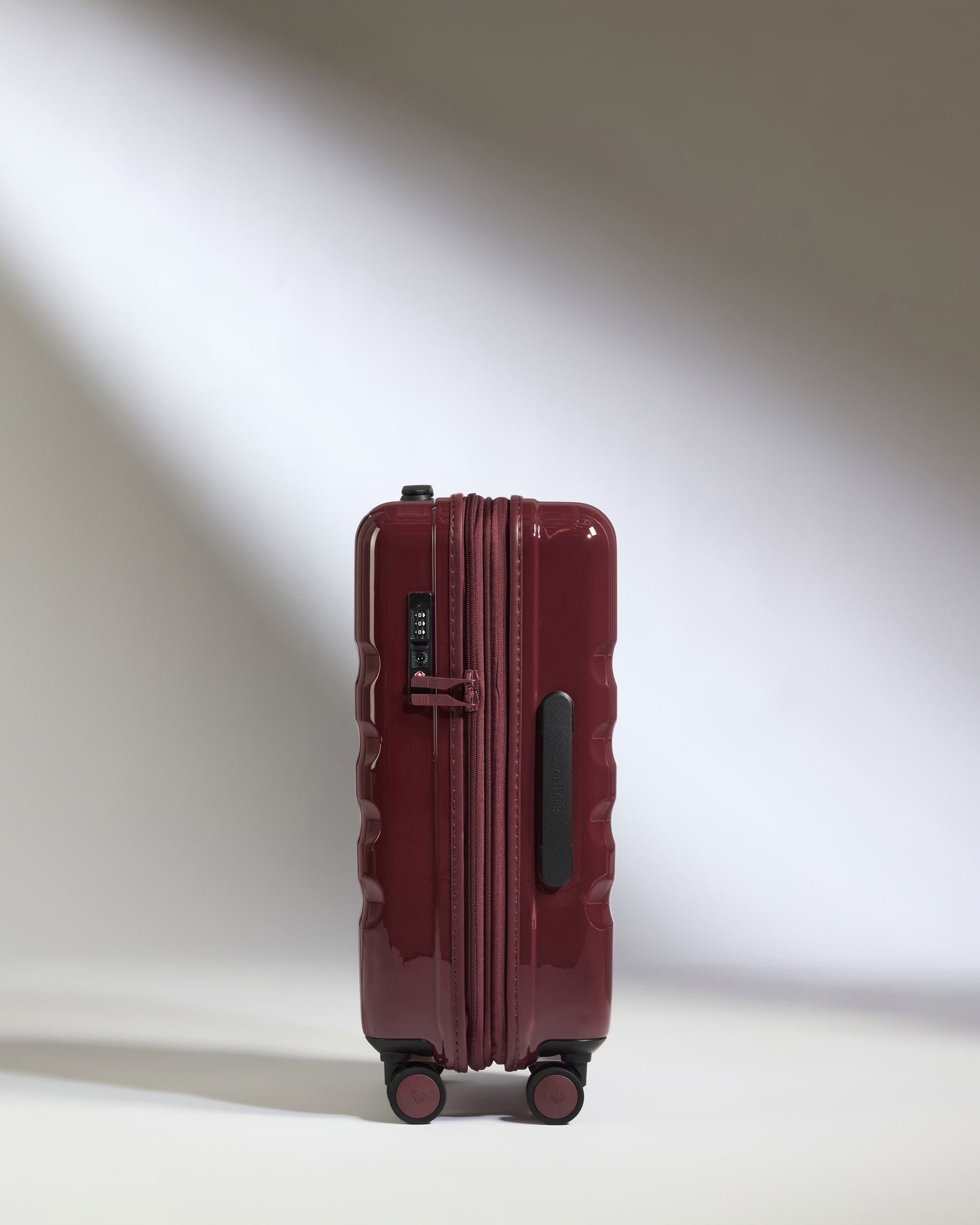 Antler Luggage -  Expandable Cabin Suitcase in Cedar Red Gloss - Icon Stripe - Hard Suitcase Expandable Cabin Suitcase in Red Gloss - Icon Stripe | Lightweight & Hard Shell Suitcase