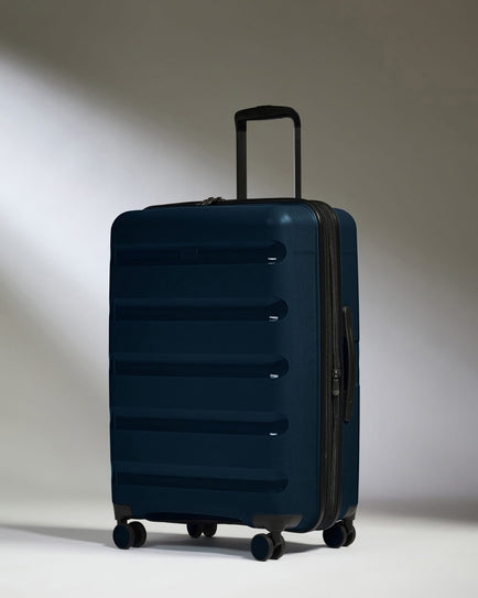 Antler Luggage -  Expandable Cabin Suitcase in Midnight Blue - Logo Stripe - Hard Suitcase - Expander Cabin Expandable Cabin Suitcase Midnight Blue - Logo Stripe | Lightweight Hard Shell Luggage