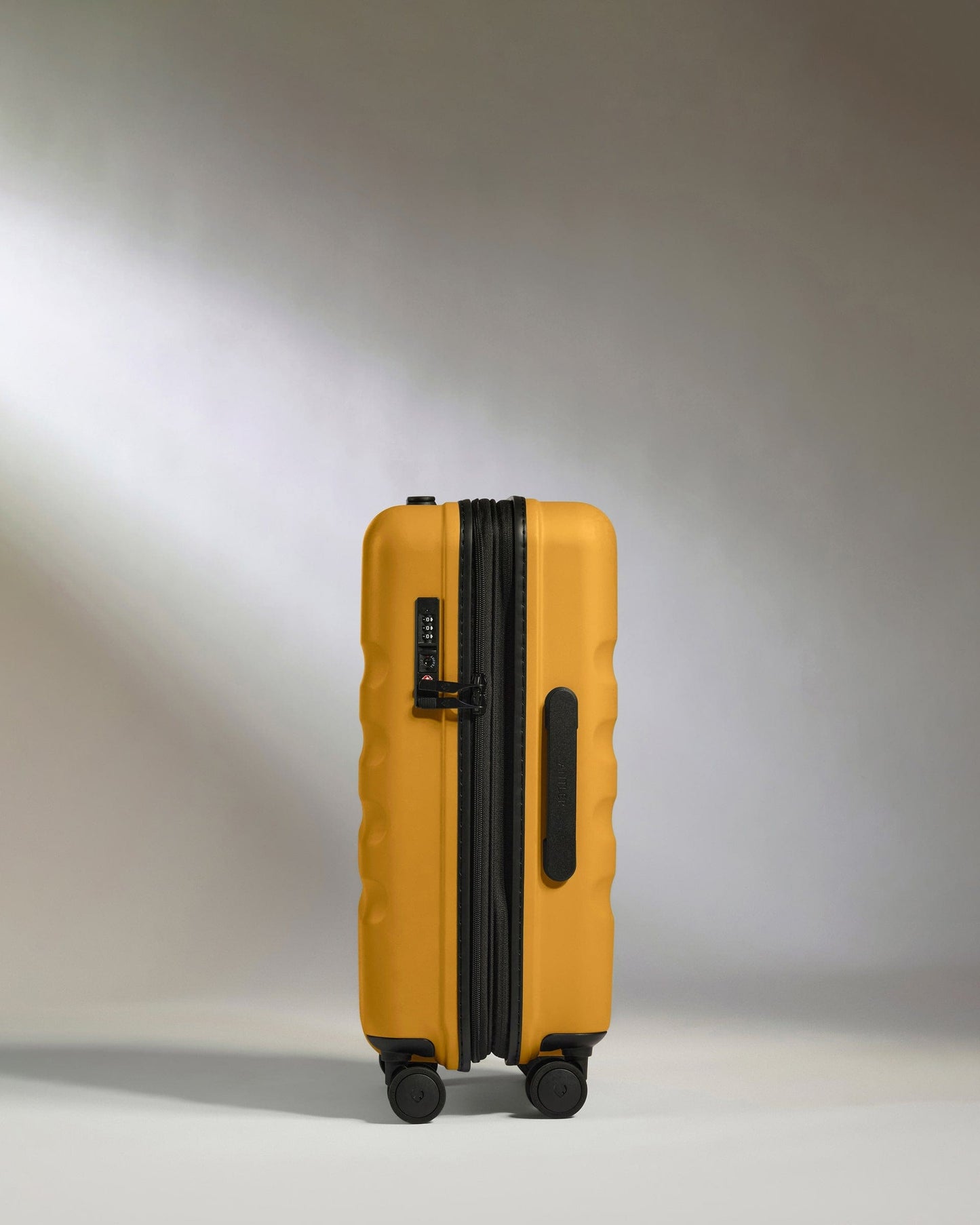 Antler Luggage -  Expandable Cabin Suitcase in Mustard Yellow - Icon Stripe - Hard Suitcase - Expander Cabin Icon Stripe Cabin with Expander in Dark Yellow | Lightweight & Hard Shell Suitcase