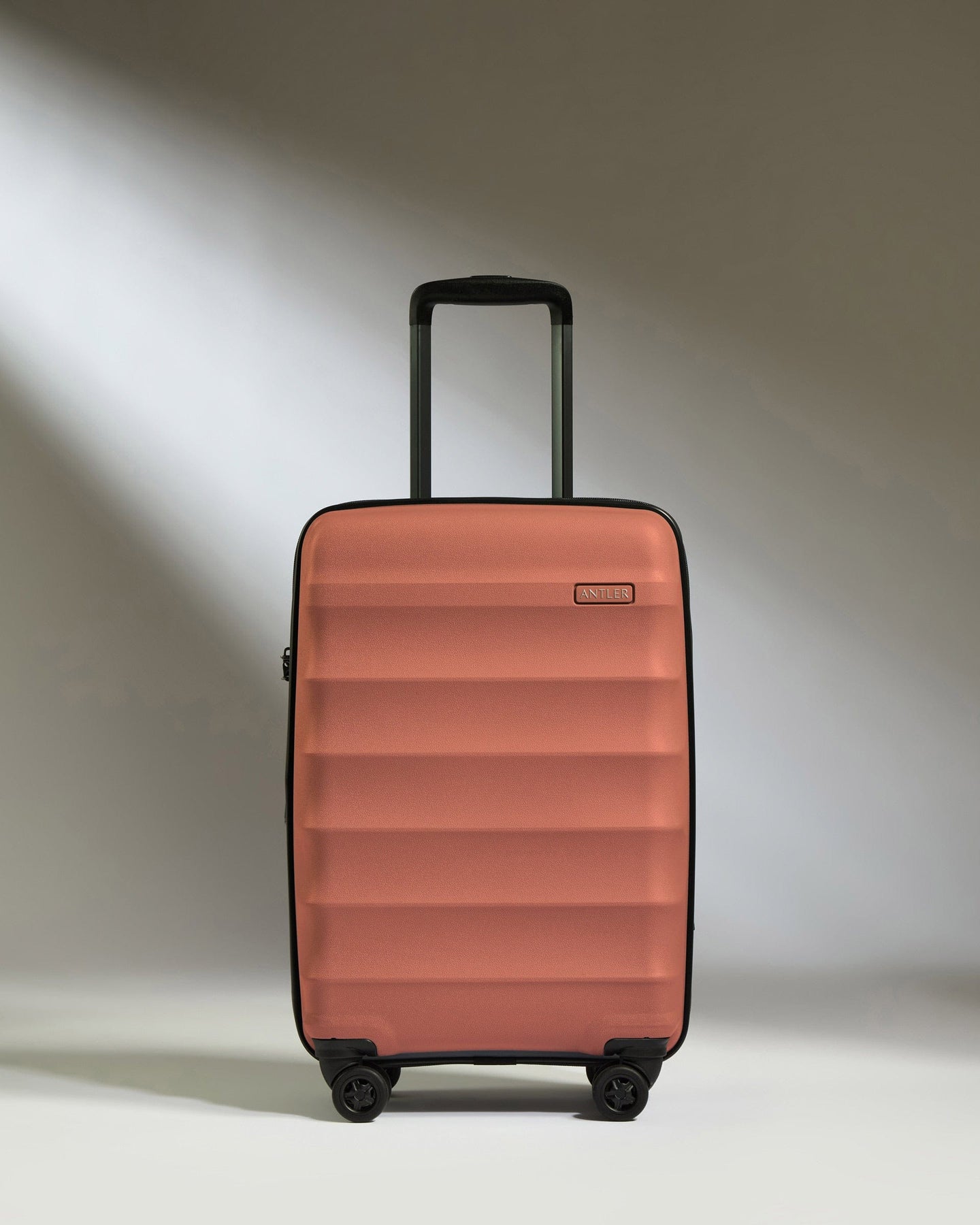 Antler Luggage -  Expandable Cabin Suitcase in Soft Orange  - Juno - Hard Suitcase - Expander Cabin Cabin Suitcase with Expander in Soft Orange - Juno | Carry-on Luggage