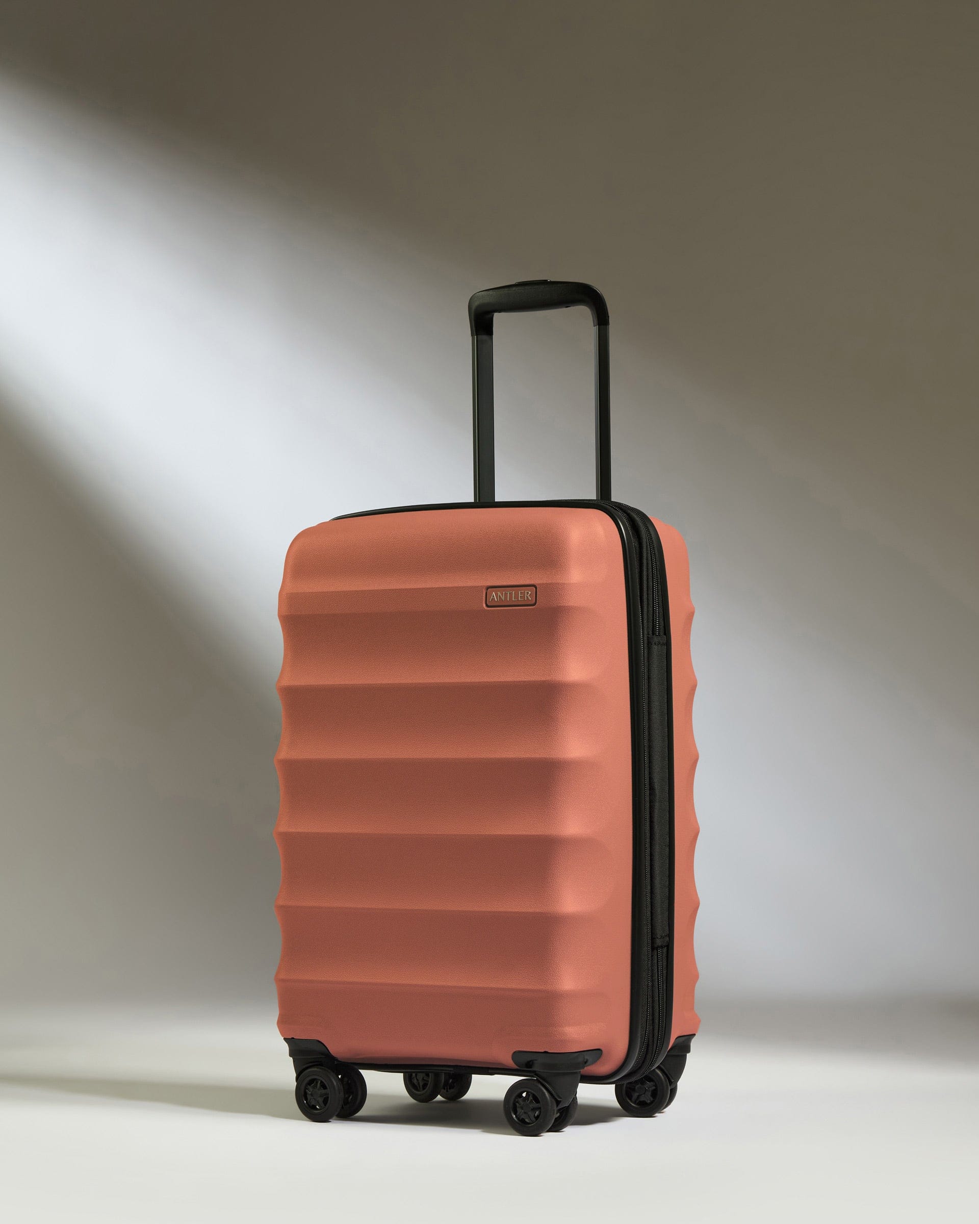 Antler Luggage -  Expandable Cabin Suitcase in Soft Orange  - Juno - Hard Suitcase - Expander Cabin Cabin Suitcase with Expander in Soft Orange - Juno | Carry-on Luggage