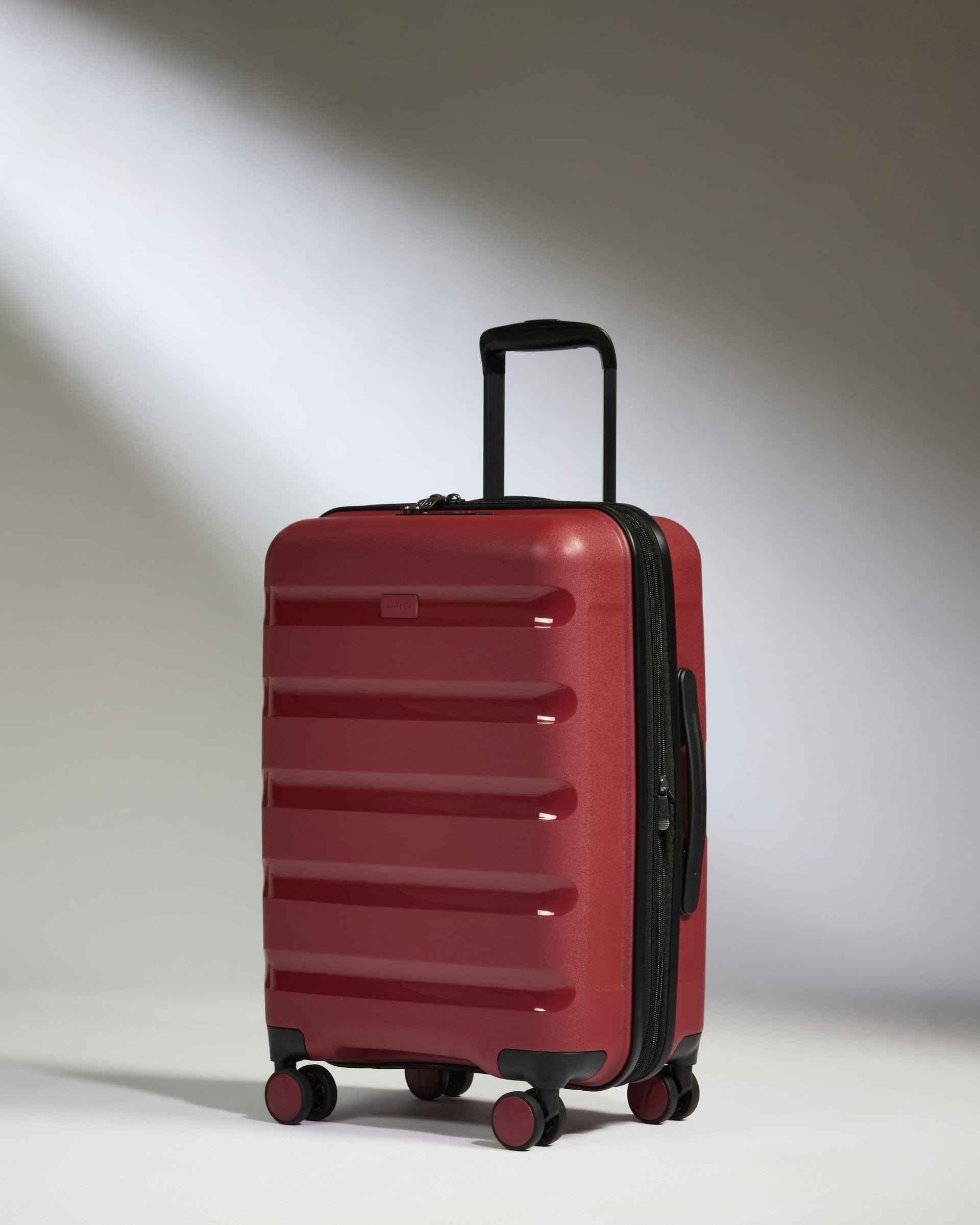 Antler Luggage -  Expandable Cabin Suitcase in Soft Red - Logo Stripe - Hard Suitcase - Expander Cabin Expandable Cabin Suitcase Red - Logo Stripe | Lightweight Hard Shell Luggage