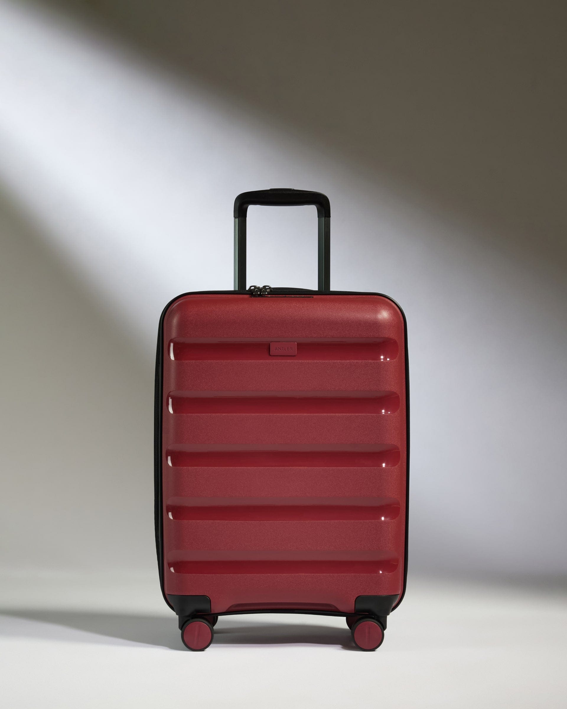 Antler Luggage -  Expandable Cabin Suitcase in Soft Red - Logo Stripe - Hard Suitcase - Expander Cabin Expandable Cabin Suitcase Red - Logo Stripe | Lightweight Hard Shell Luggage