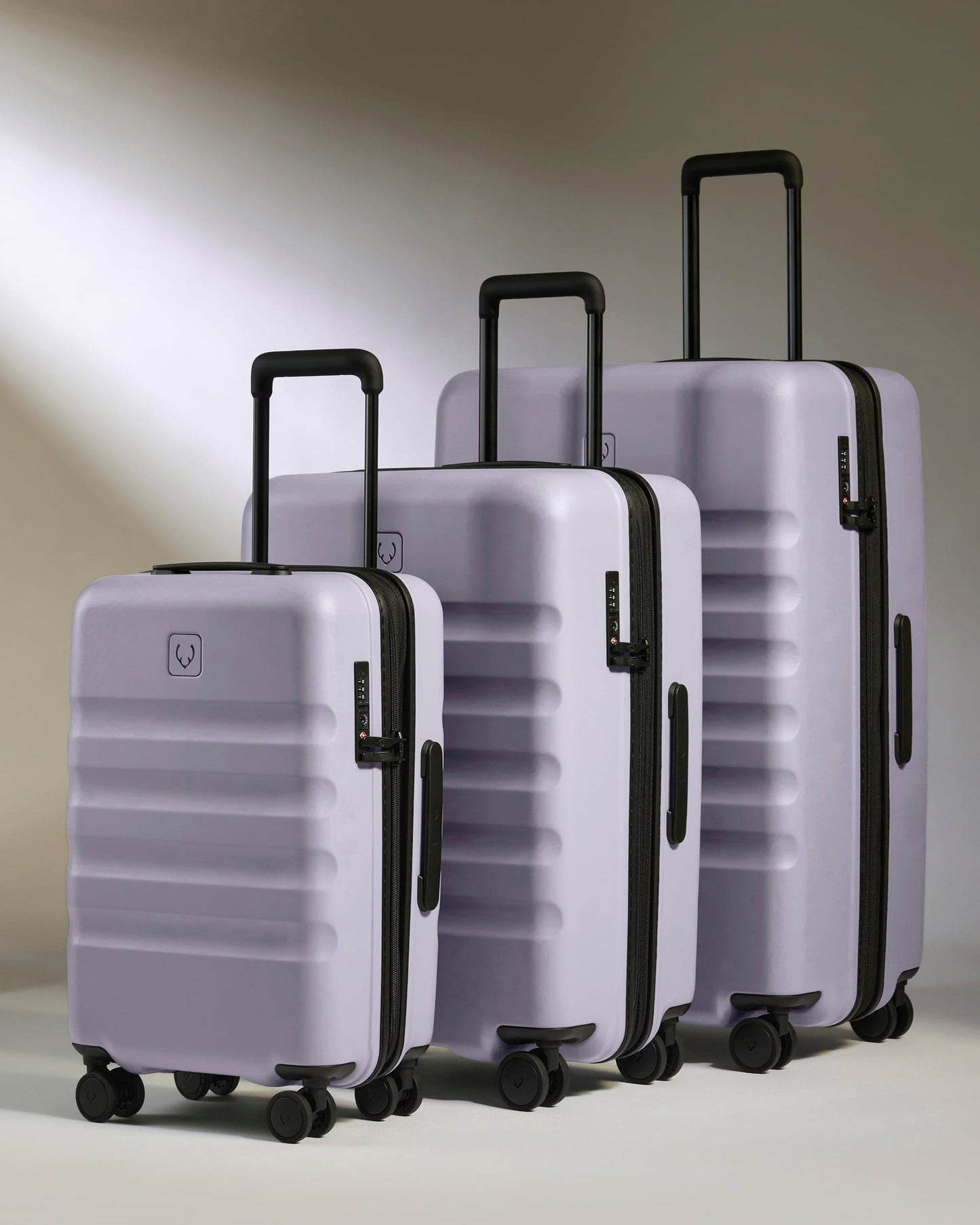 Antler Luggage -  Expandable Cabin Suitcase Set in Meadow Purple - Icon Stripe - Hard Suitcase - Expander Cabin Set Expandable Cabin Suitcase Set in Light Purple - Icon Stripe | Lightweight & Hard Shell Suitcase
