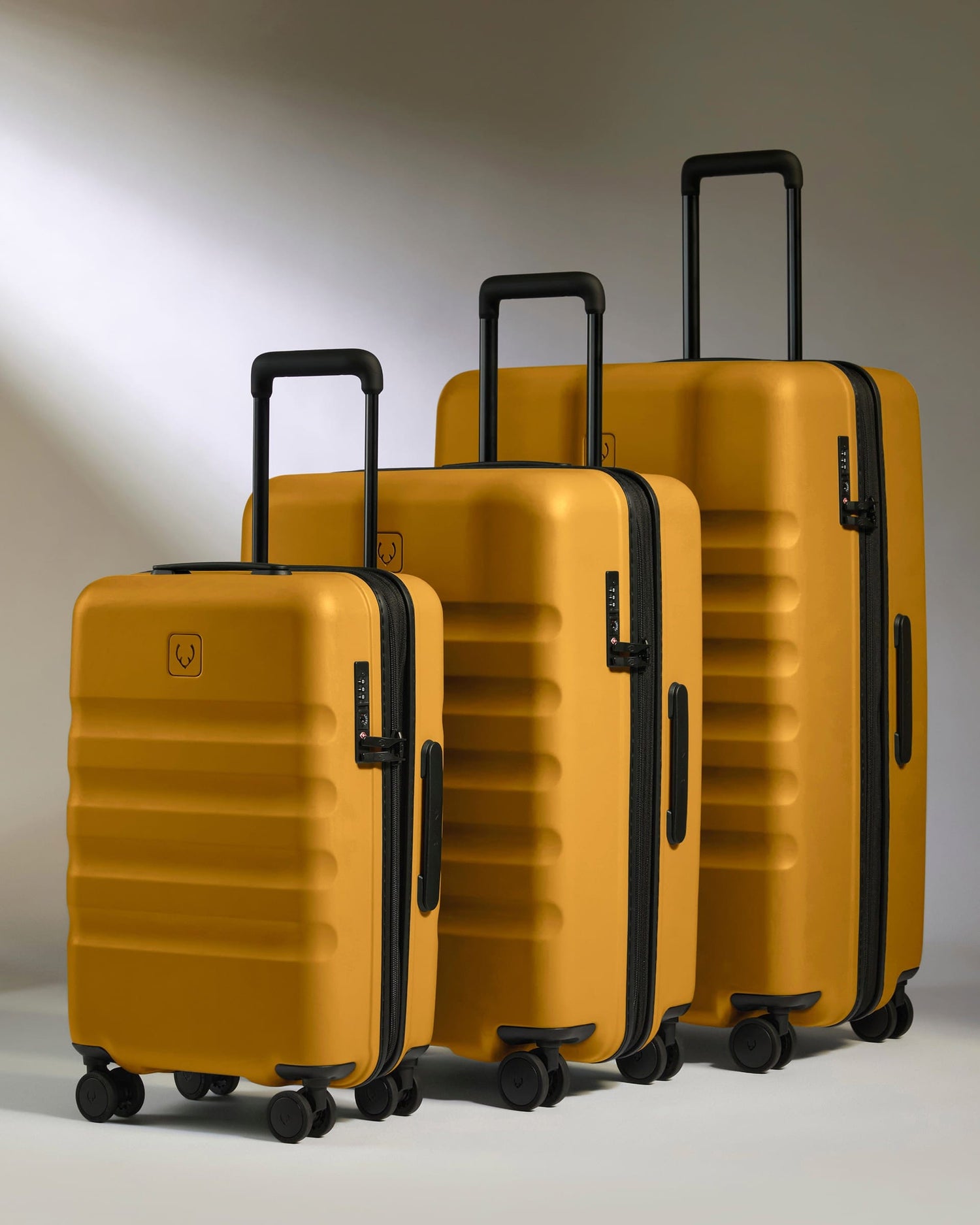 Antler Luggage -  Expandable Cabin Suitcase Set in Mustard Yellow - Icon Stripe - Hard Suitcase - Expander Cabin Set Expandable Cabin Suitcase Set in Dark Yellow - Icon Stripe | Lightweight & Hard Shell Suitcase