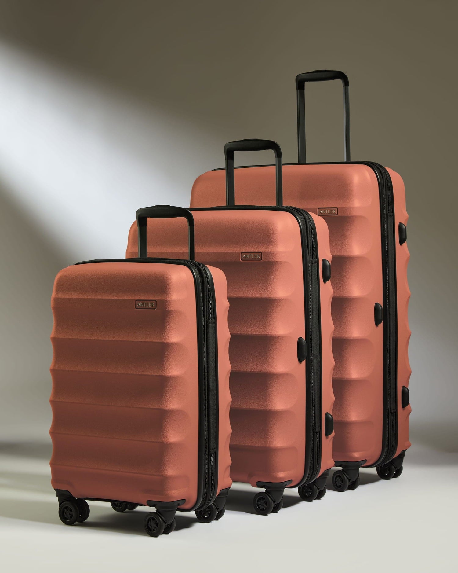 Antler Luggage -  Expandable Cabin Suitcase Set in Soft Orange- Juno - Hard Suitcase Expandable Cabin Suitcase Set in Soft Orange - Juno | Lightweight & Hard Shell Suitcase