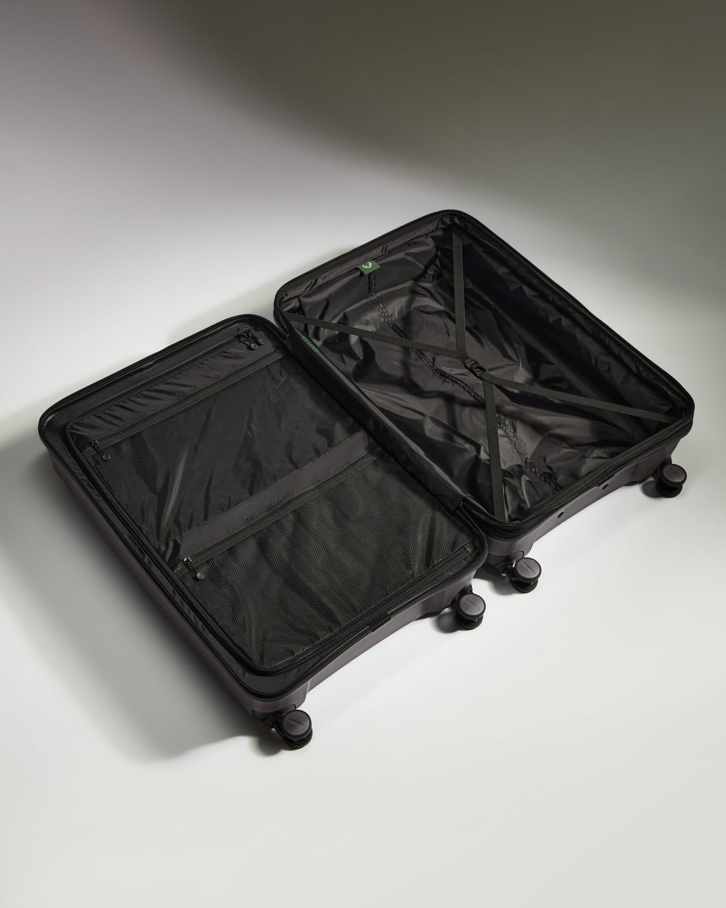 Antler Luggage -  Expandable Large Suitcase in Gloss Gull Grey - Logo Stripe - Expanding Rollercase | Large 4W Expandable Large Suitcase in Gloss Gull Grey - Logo Stripe
