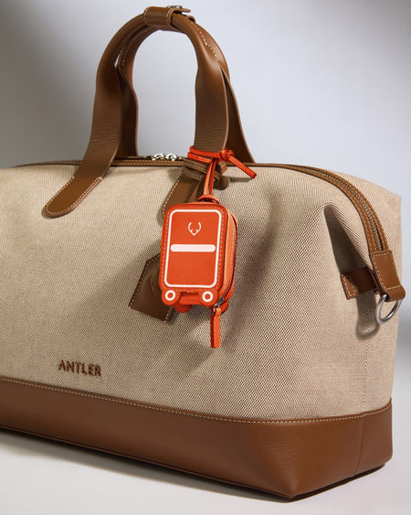 Antler Luggage -  Heritage Leather AirPods Case in Coral - Airpod Case Leather Airpod Case in Orange | Airpod Earbud Holder & Travel Accessories