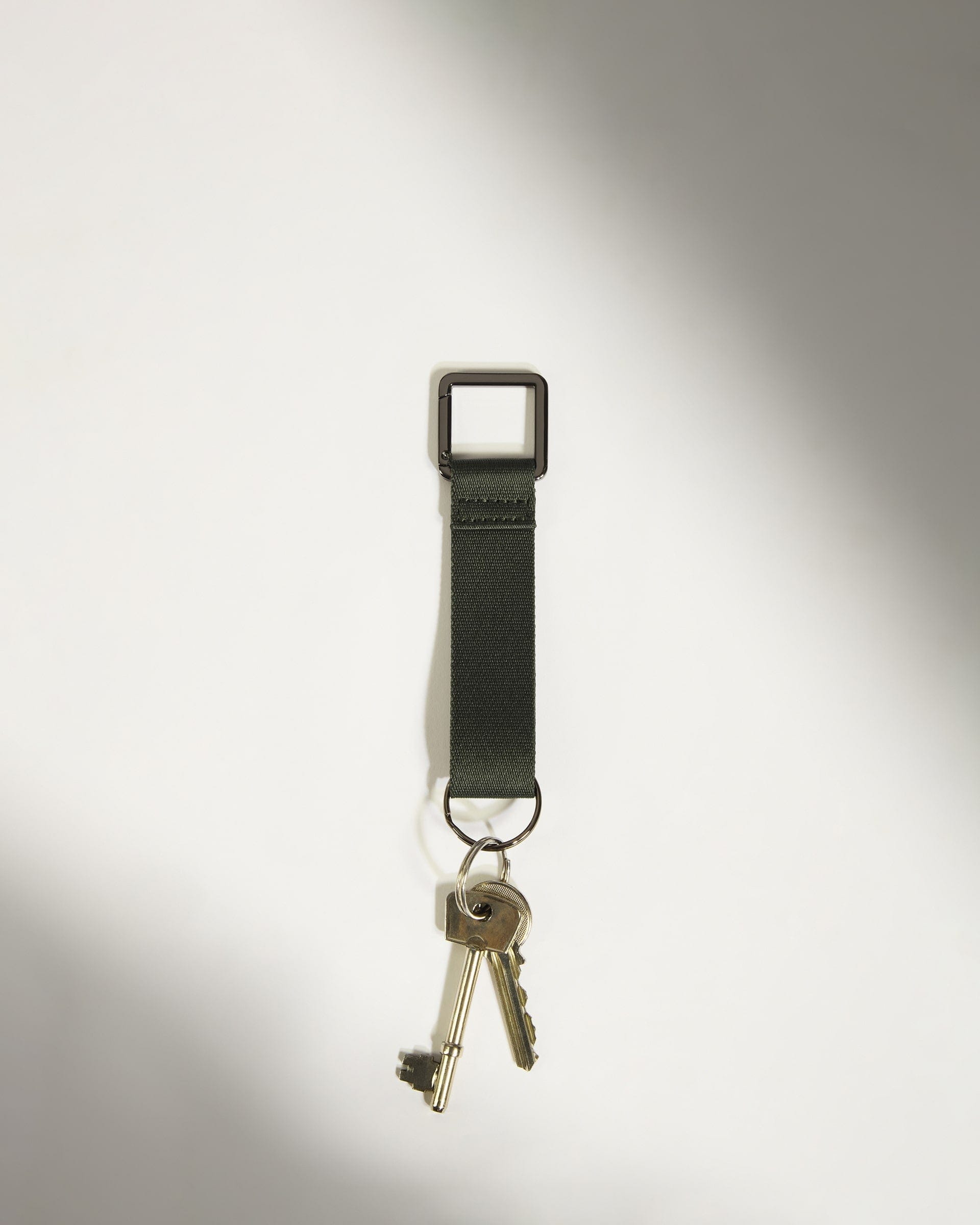 Antler Luggage -  Icon Keyring in Dark Khaki Green - Keyring Icon Keyring in Khaki Green | Keychain & Travel Bag Accessories