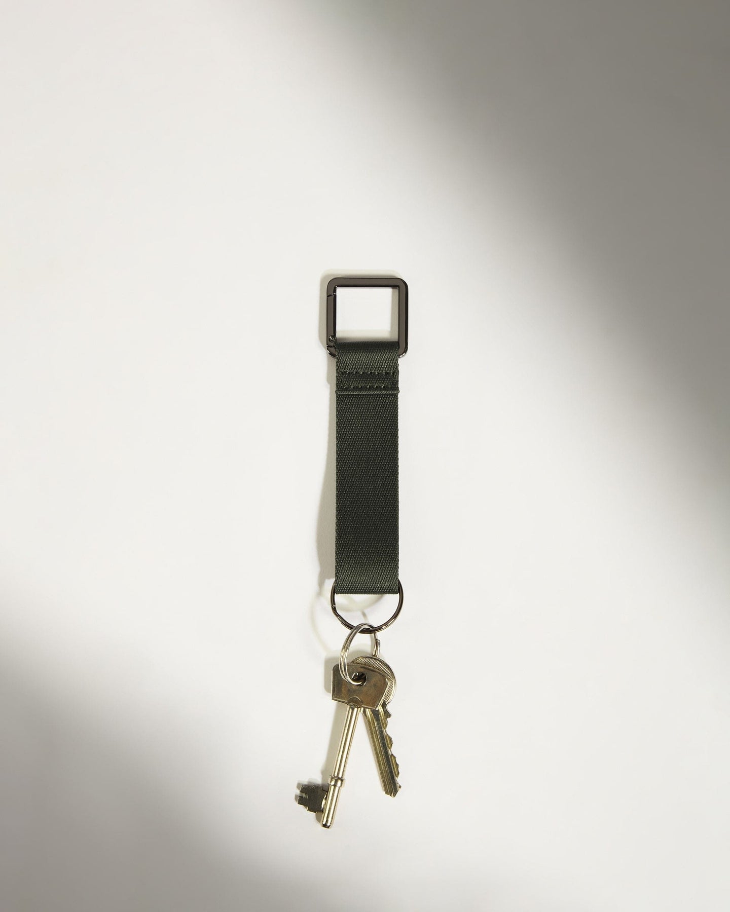Antler Luggage -  Icon Keyring in Dark Khaki Green - Keyring Icon Keyring in Khaki Green | Keychain & Travel Bag Accessories