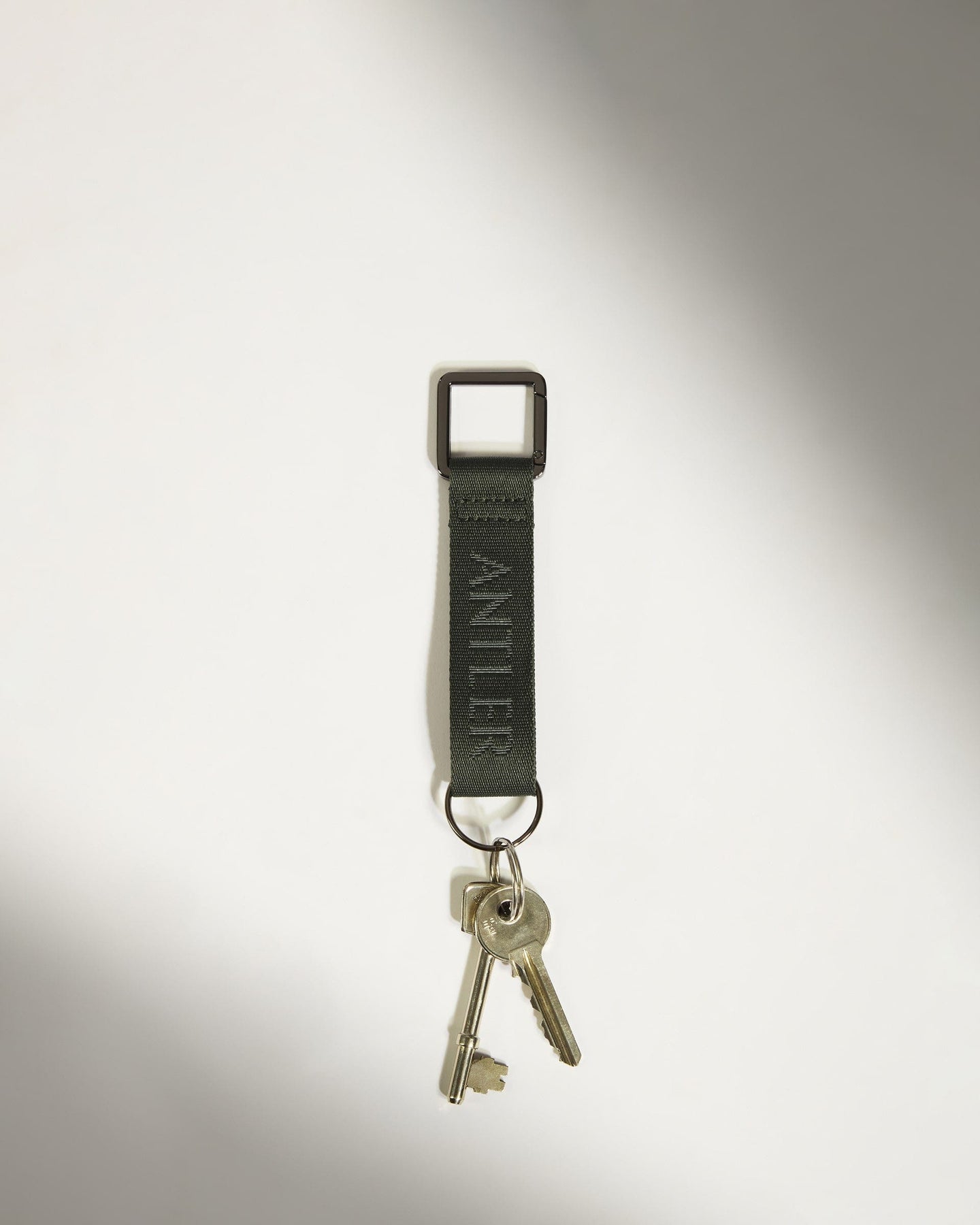 Antler Luggage -  Icon Keyring in Dark Khaki Green - Keyring Icon Keyring in Khaki Green | Keychain & Travel Bag Accessories