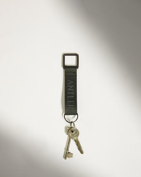 Antler Luggage -  Icon Keyring in Dark Khaki Green - Keyring Icon Keyring in Khaki Green | Keychain & Travel Bag Accessories