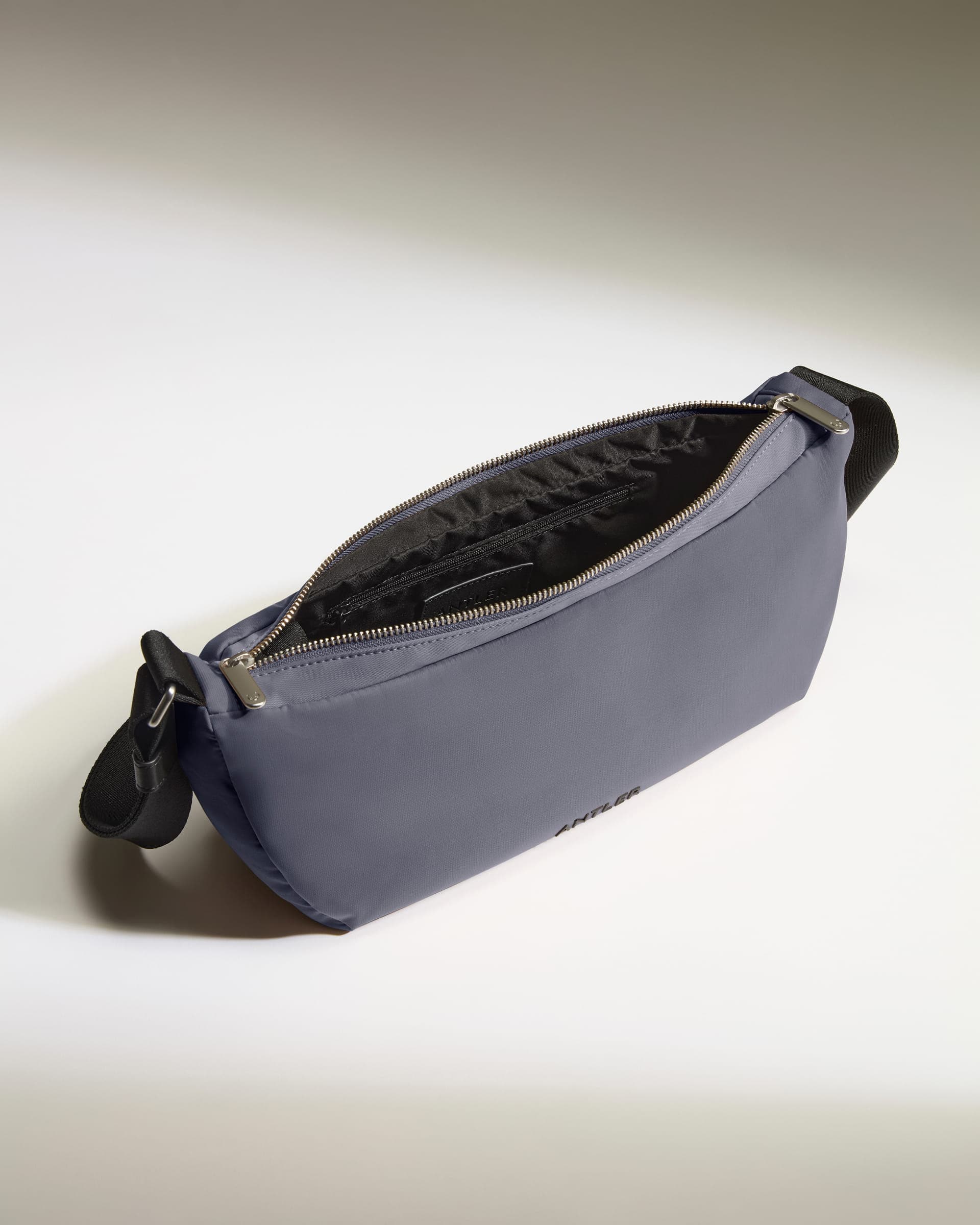 Antler Luggage -  Icon Slingbag in Meadow Purple - Cross Body Bag Icon Slingbag in Purple | Crossbody Travel Bag & Accessories