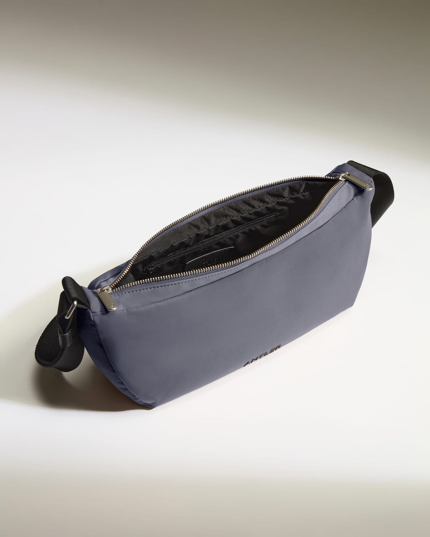 Antler Luggage -  Icon Slingbag in Meadow Purple - Cross Body Bag Icon Slingbag in Purple | Crossbody Travel Bag & Accessories