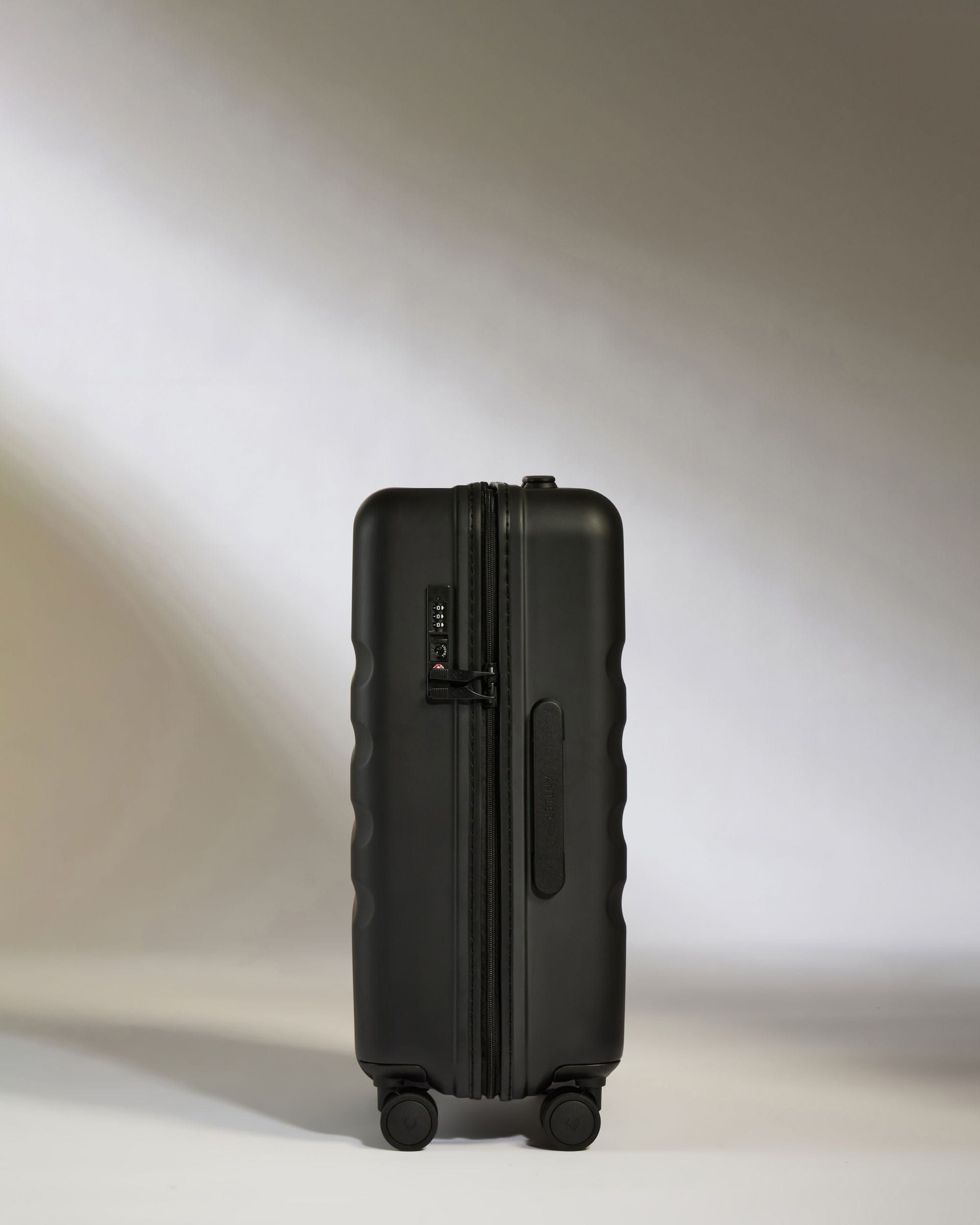 Large Cabin Suitcase in Black Icon Stripe Lightweight Hard Shell Suitcase Antler UK