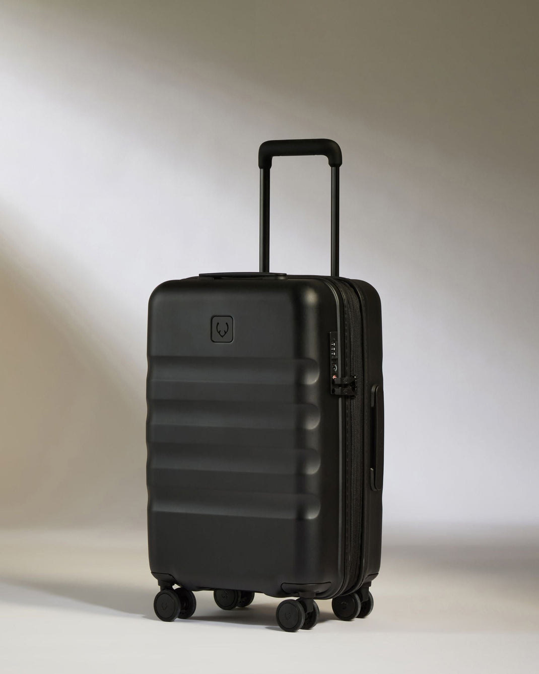 Cabin with Pocket Suitcase in Black - Icon Stripe | Hard Suitcase ...