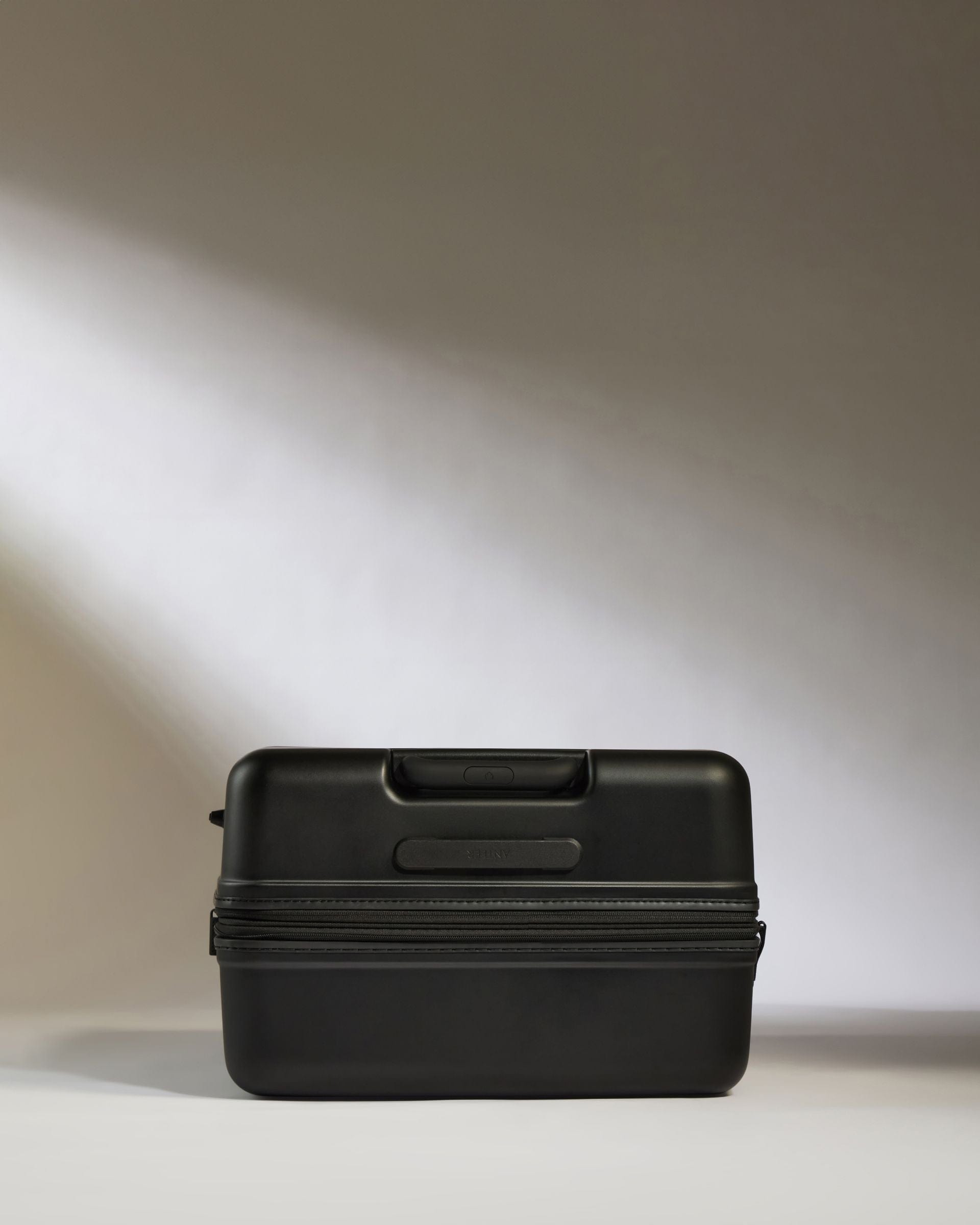 Antler Luggage -  Icon Stripe Large in Black - Hard Suitcase Icon Stripe Large Suitcase in Black | Lightweight & Hard Shell Suitcase