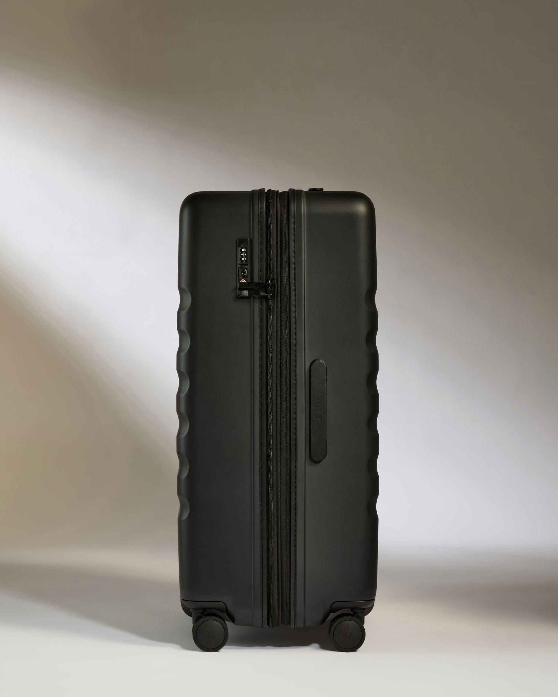 Antler Luggage -  Icon Stripe Large in Black - Hard Suitcase Icon Stripe Large Suitcase in Black | Lightweight & Hard Shell Suitcase