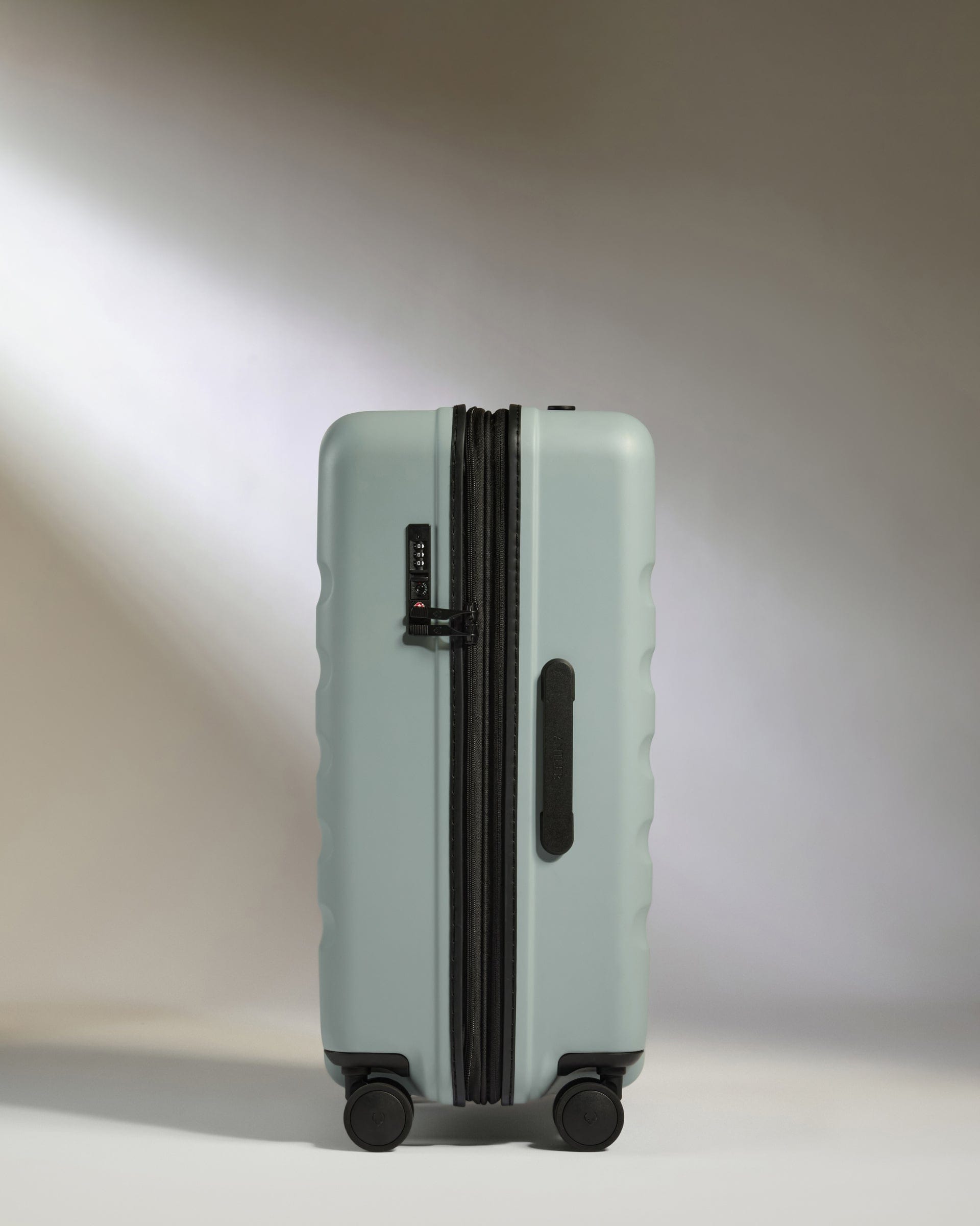 Antler Luggage -  Icon Stripe Medium in Mist Blue - Hard Suitcase Icon Stripe Medium Suitcase in Blue | Lightweight & Hard Shell Suitcase