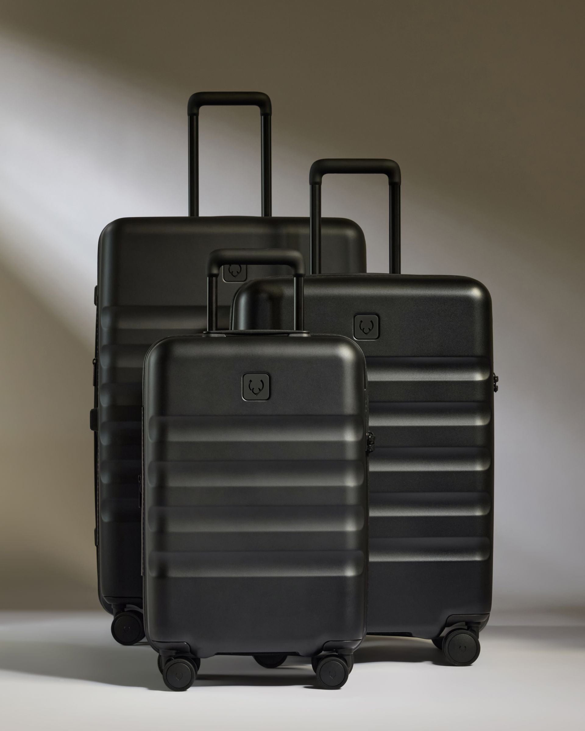 Antler Luggage -  Icon Stripe Set with Expander Cabin in Black - Hard Suitcase Icon Stripe Set with Expander Cabin in Black | Lightweight & Hard Shell Suitcase