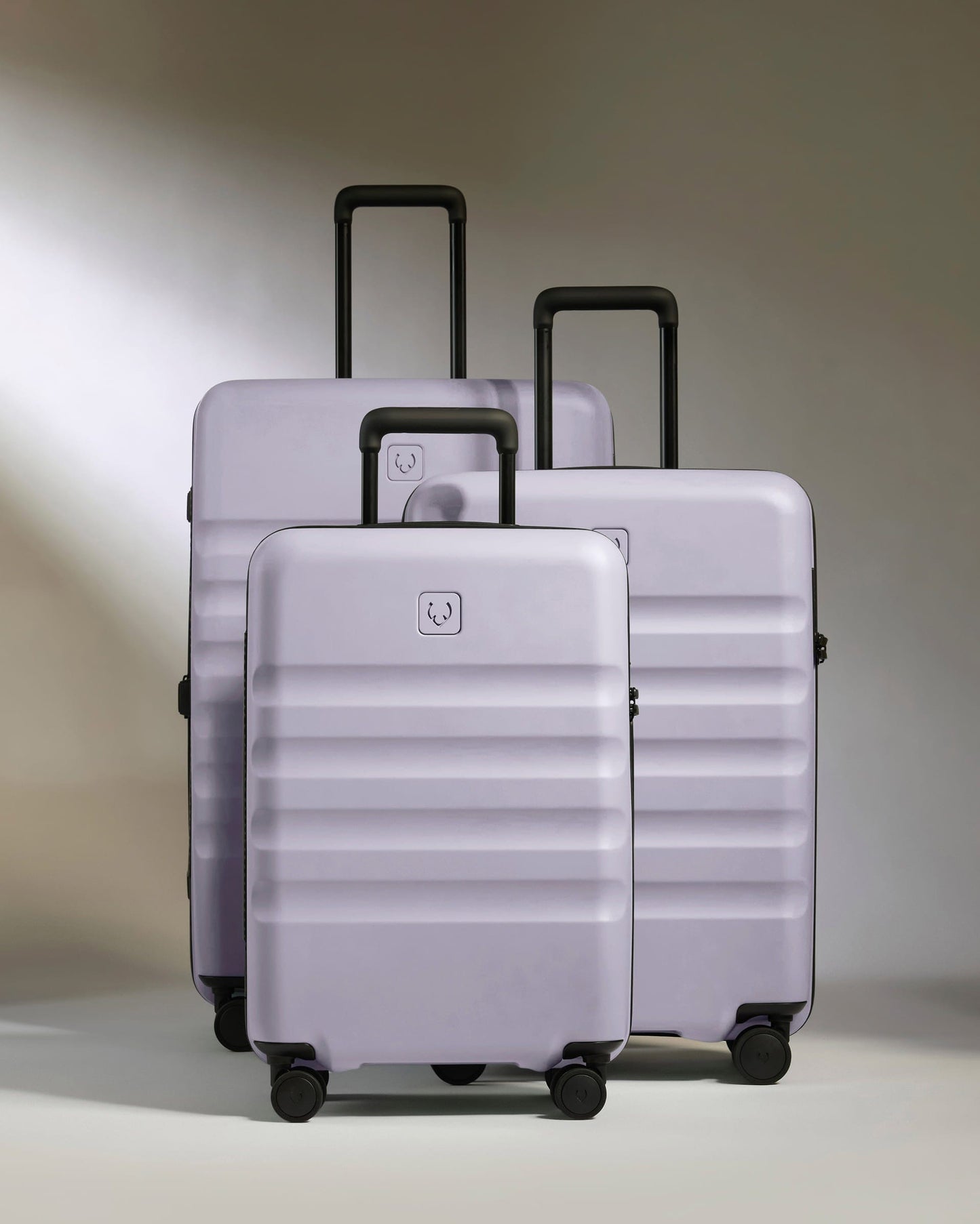 Antler Luggage -  Large Cabin Suitcase Set in Meadow Purple - Icon Stripe - Hard Suitcase - Large Cabin Set Large Cabin Suitcase Set in Light Purple - Icon Stripe | Lightweight & Hard Shell Suitcase