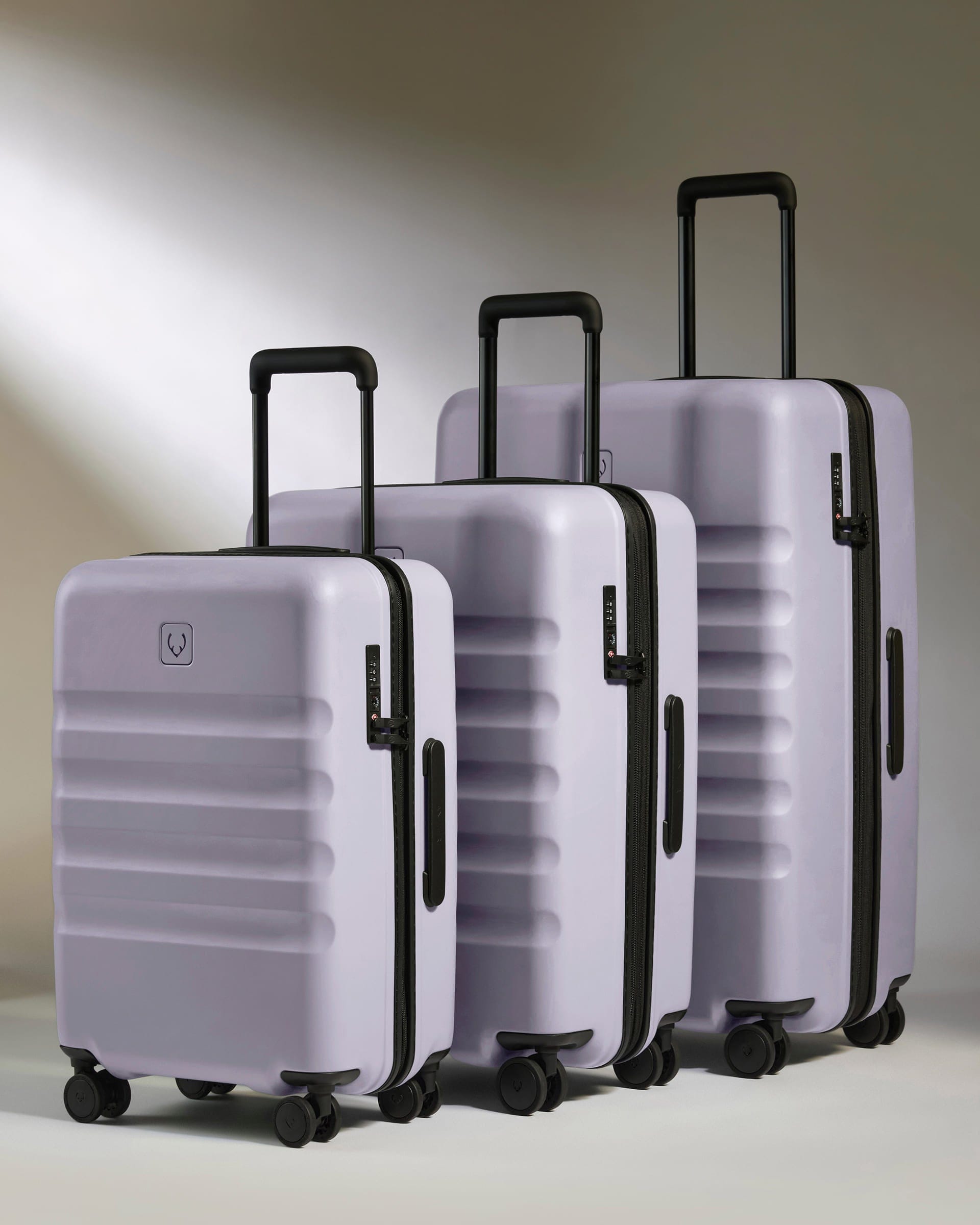 Antler Luggage -  Large Cabin Suitcase Set in Meadow Purple - Icon Stripe - Hard Suitcase - Large Cabin Set Large Cabin Suitcase Set in Light Purple - Icon Stripe | Lightweight & Hard Shell Suitcase