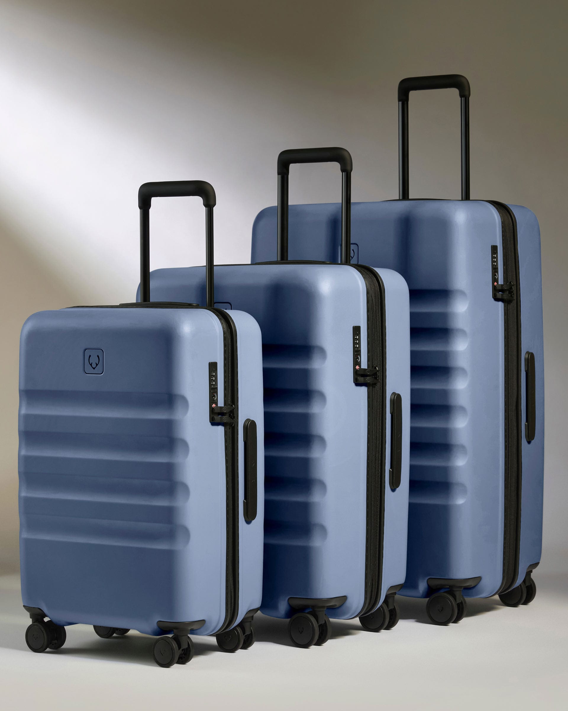 Antler Luggage -  Large Cabin Suitcase Set in Ocean Blue - Icon Stripe - Hard Suitcase - Large Cabin Set Large Cabin Suitcase Set in Blue - Icon Stripe | Lightweight & Hard Shell Suitcase