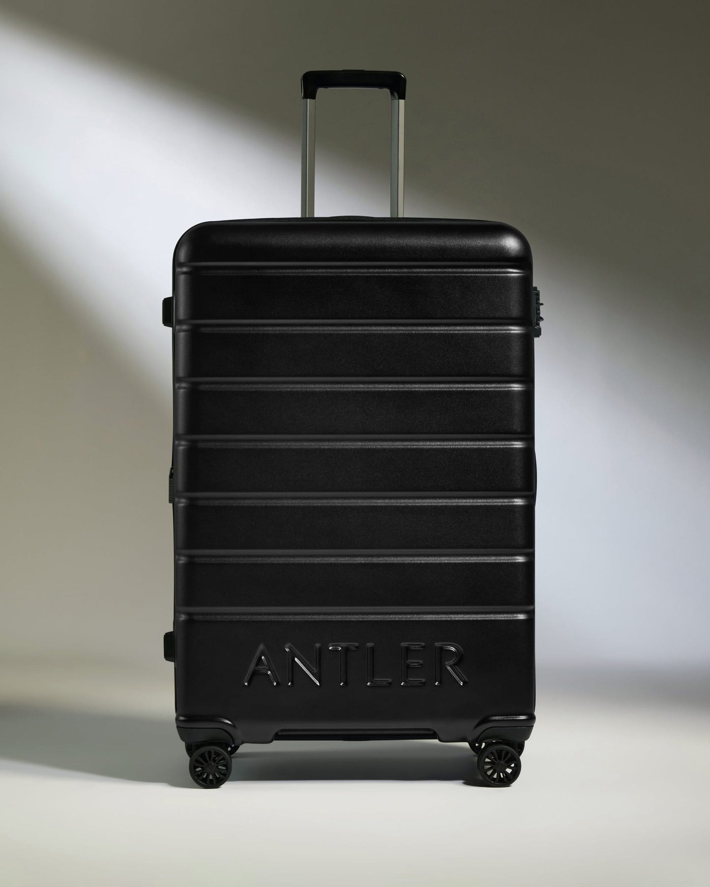 Antler Luggage -  Large Suitcase in Black - Logo - Hard Suitcases Large Suitcase Black - Logo | Lightweight Hard Shell Luggage