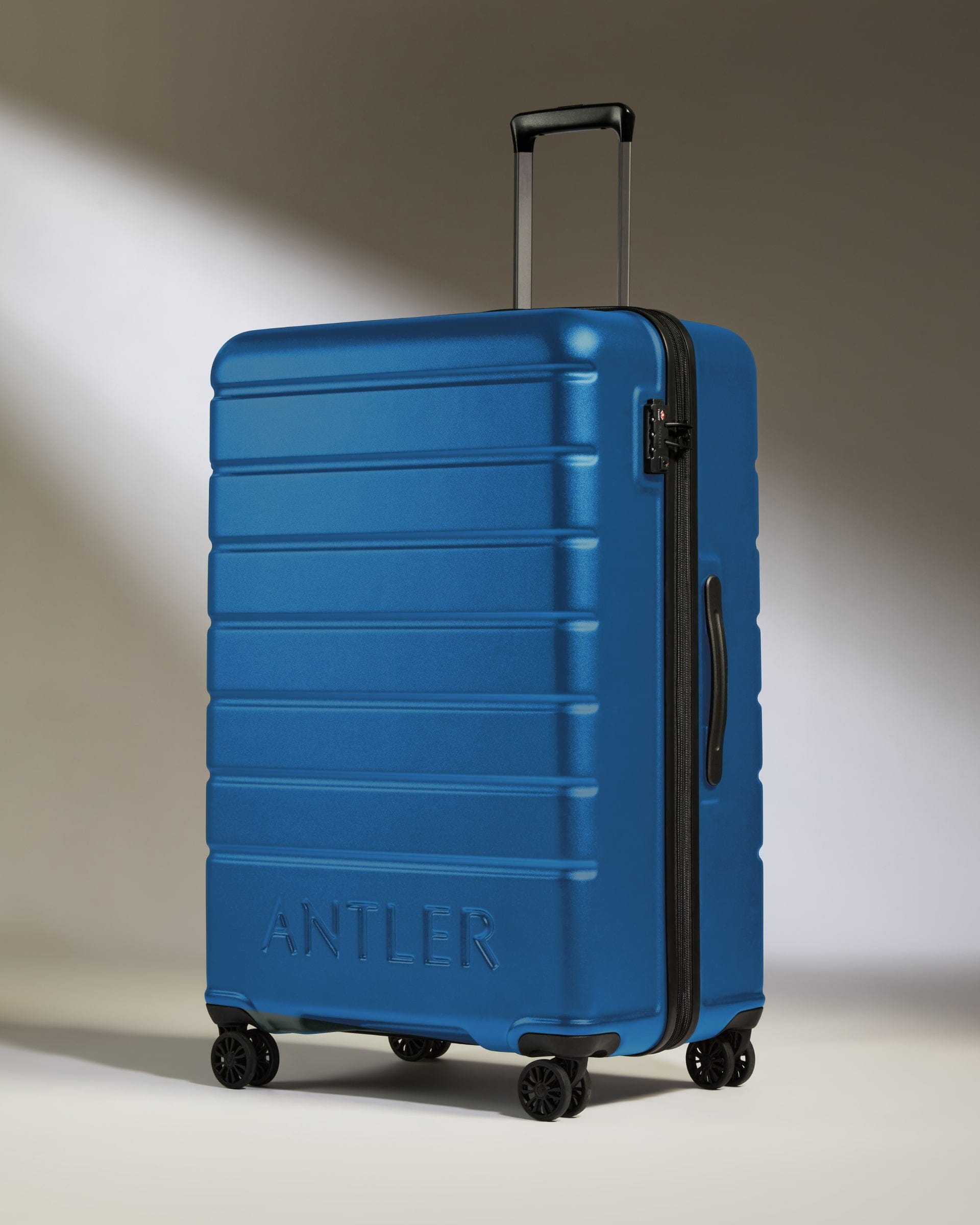 Large Suitcase Bold Blue Logo Lightweight Hard Shell Luggage