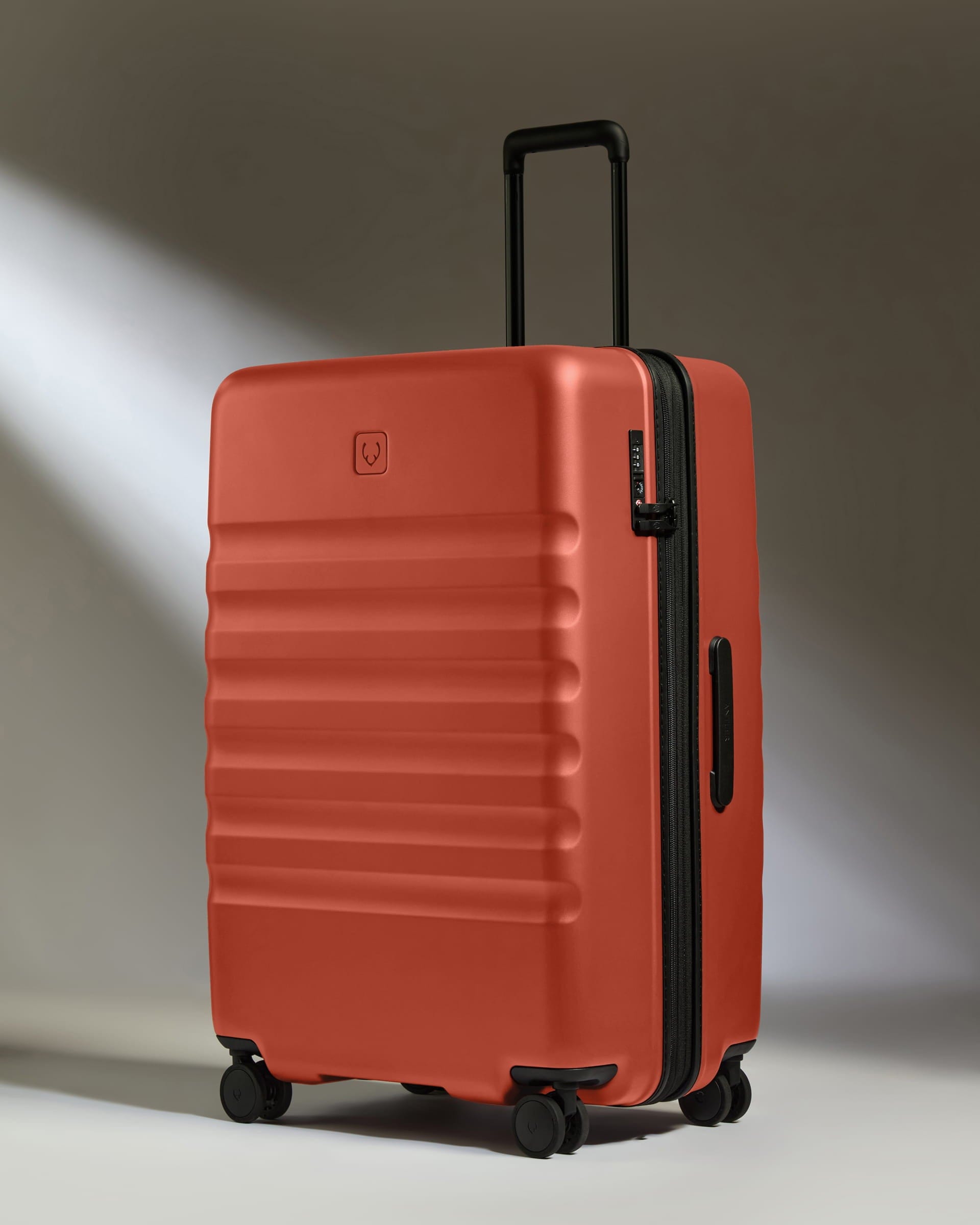 Antler Luggage -  Large Suitcase in Buckthorn Red - Icon Stripe - Hard Suitcase - Large Icon Stripe Large Suitcase in Buckthorn Red | Lightweight & Hard Shell Suitcase