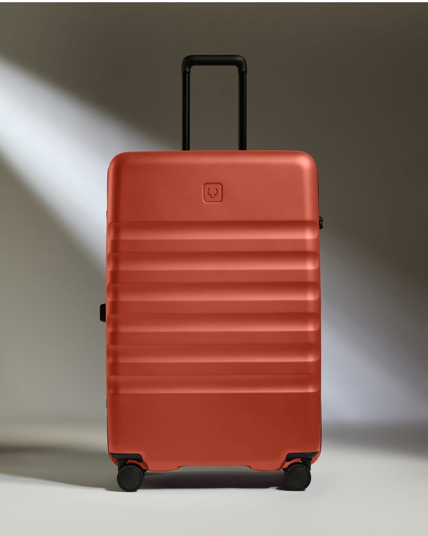 Antler Luggage -  Large Suitcase in Buckthorn Red - Icon Stripe - Hard Suitcase - Large Icon Stripe Large Suitcase in Buckthorn Red | Lightweight & Hard Shell Suitcase
