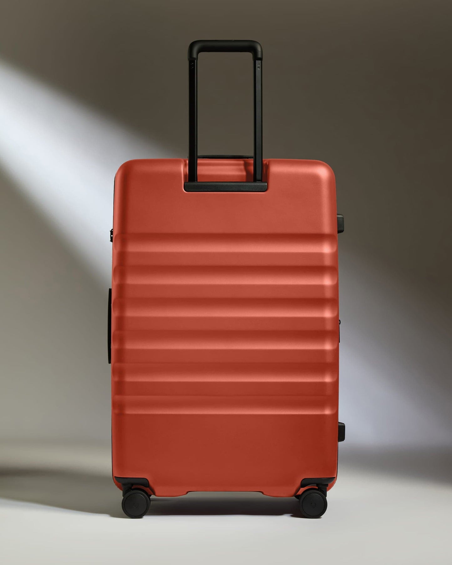 Antler Luggage -  Large Suitcase in Buckthorn Red - Icon Stripe - Hard Suitcase - Large Icon Stripe Large Suitcase in Buckthorn Red | Lightweight & Hard Shell Suitcase