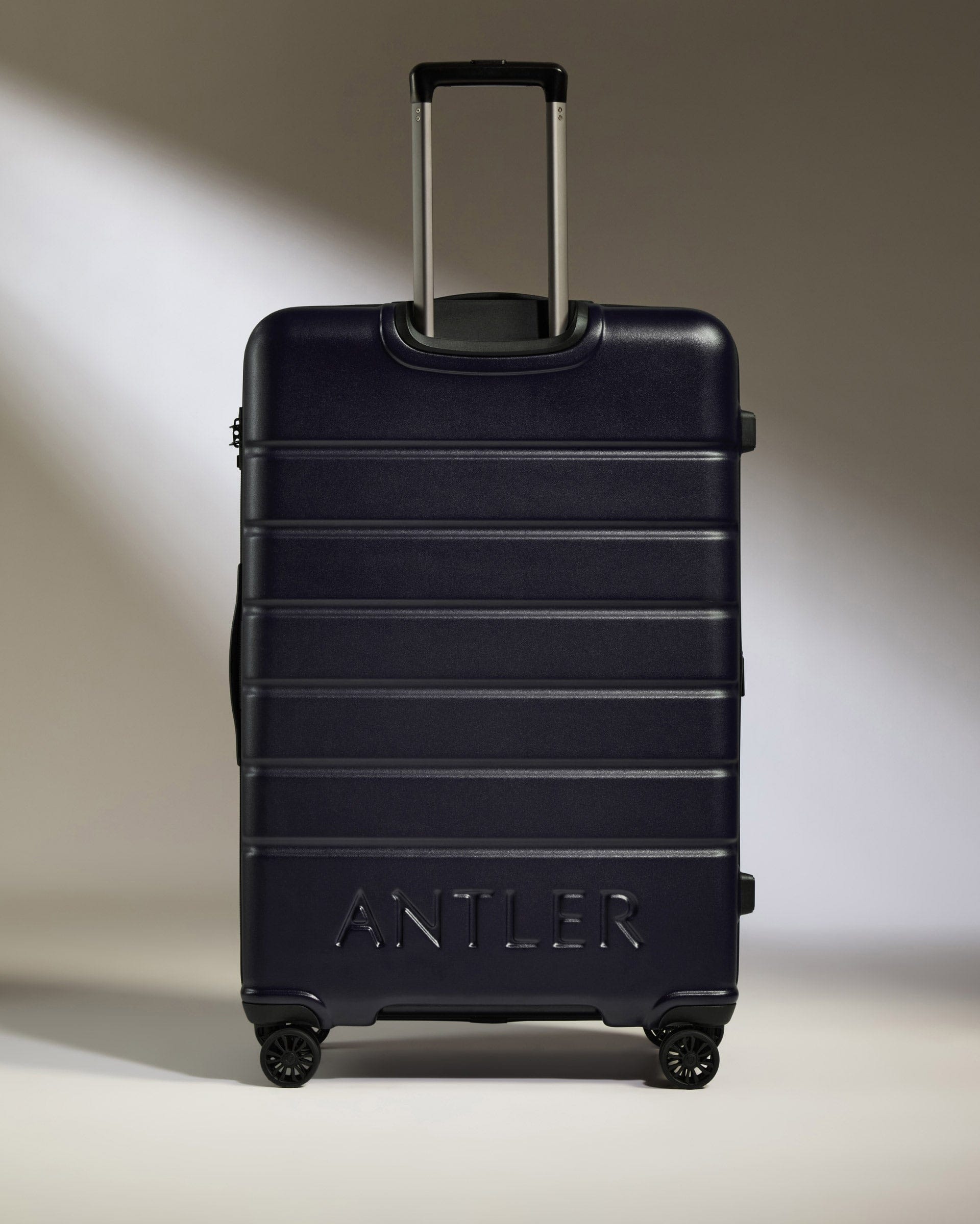 Antler Luggage -  Large Suitcase in Dark Purple - Logo - Hard Suitcase - Large Large Suitcase Dark Purple - Logo | Lightweight Hard Shell Luggage