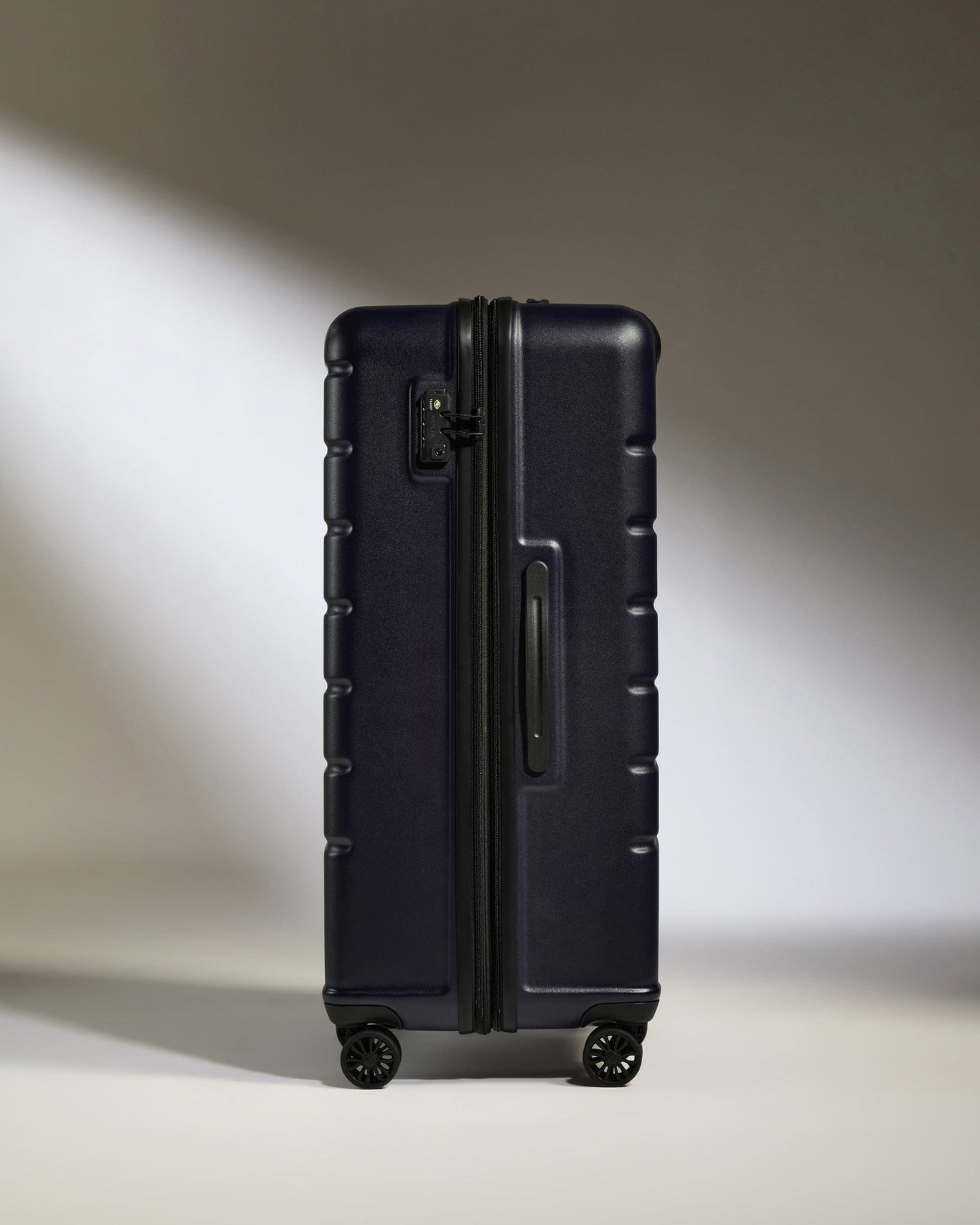 Antler Luggage -  Large Suitcase in Dark Purple - Logo - Hard Suitcase - Large Large Suitcase Dark Purple - Logo | Lightweight Hard Shell Luggage