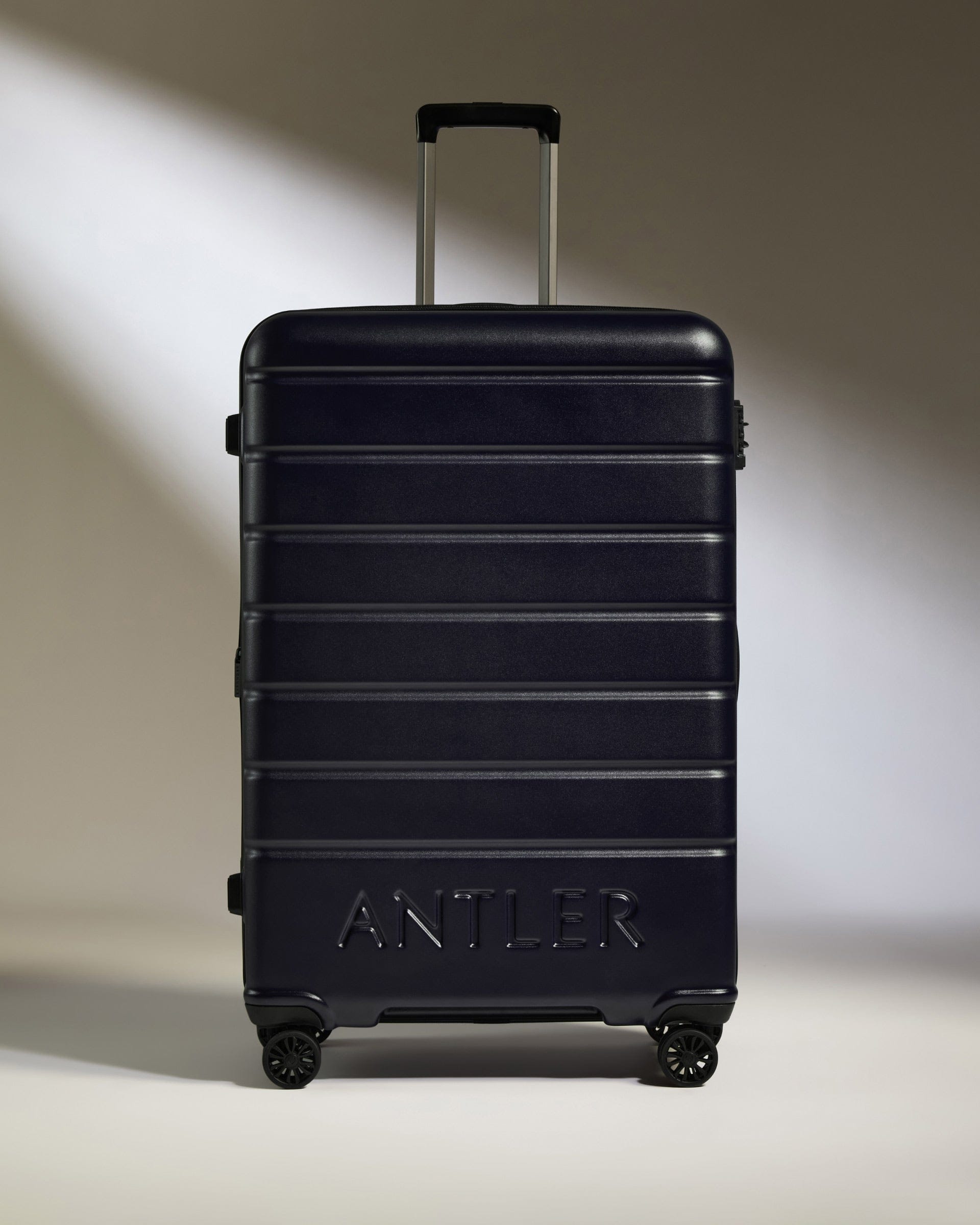 Antler Luggage -  Large Suitcase in Dark Purple - Logo - Hard Suitcase - Large Large Suitcase Dark Purple - Logo | Lightweight Hard Shell Luggage