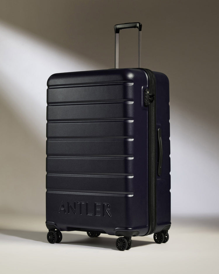 Antler Luggage -  Large Suitcase in Dark Purple - Logo - Hard Suitcase - Large Large Suitcase Dark Purple - Logo | Lightweight Hard Shell Luggage