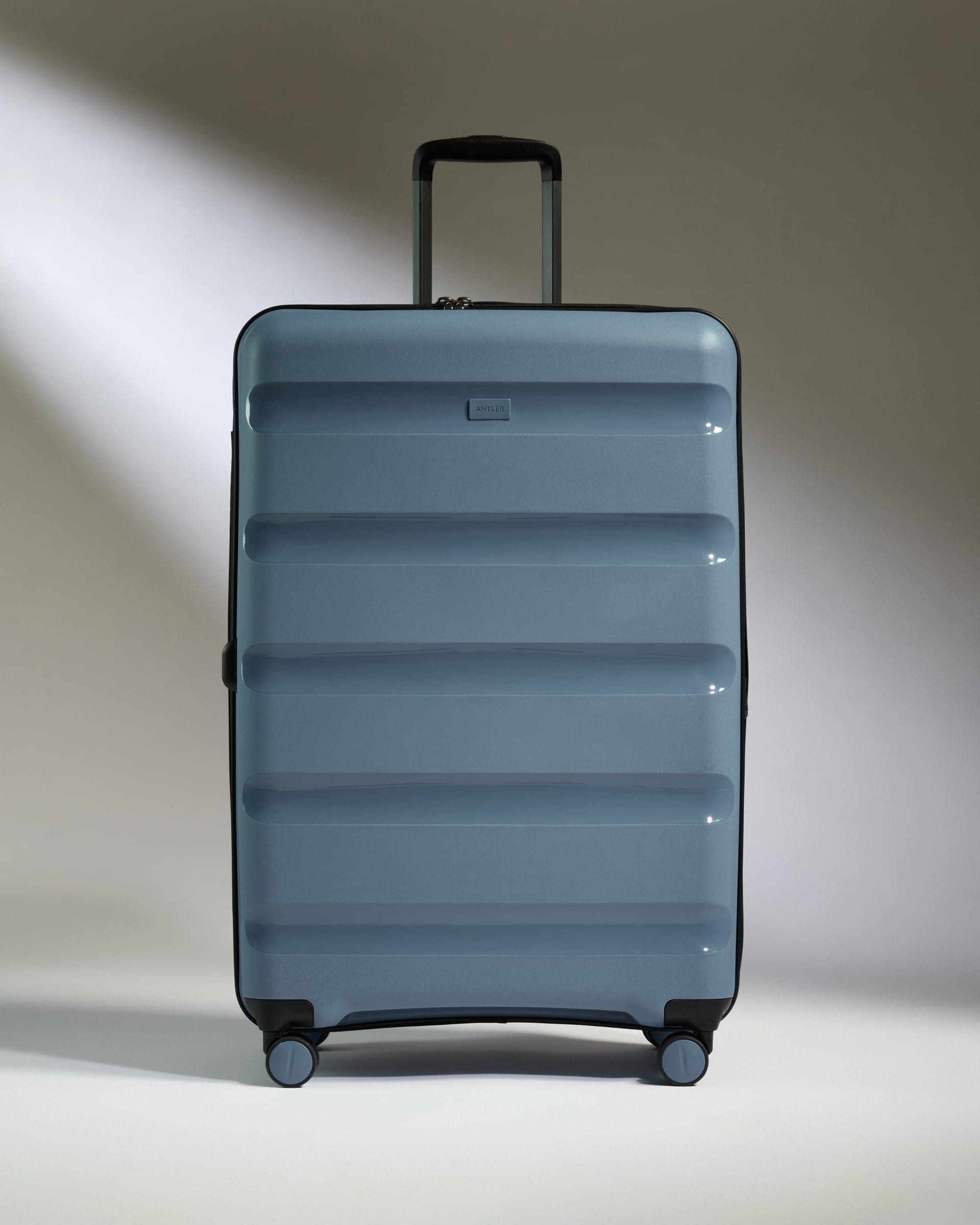Antler Luggage -  Large Suitcase in Light Blue - Logo Stripe - Hard Suitcase - Large Large Suitcase Light Blue - Logo Stripe | Lightweight Hard Shell Luggage