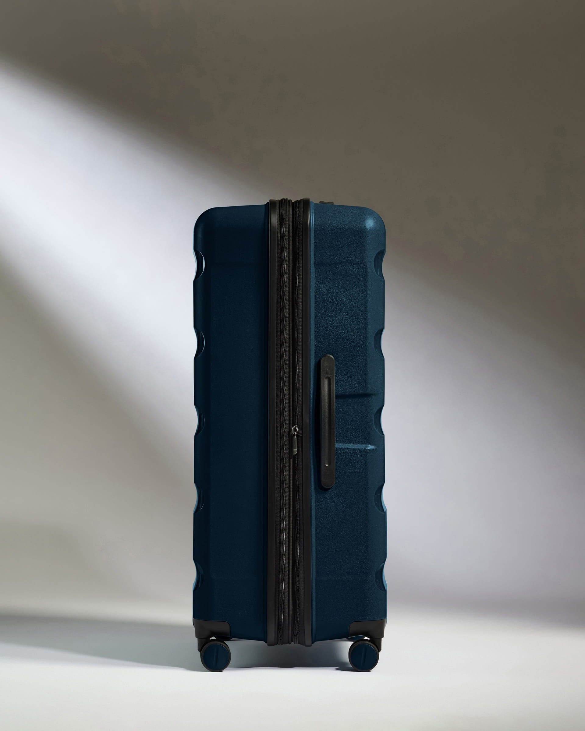 Antler Luggage -  Large Suitcase in Midnight Blue - Logo Stripe - Hard Suitcase - Large Large Suitcase Midnight Blue - Logo Stripe | Lightweight Hard Shell Luggage