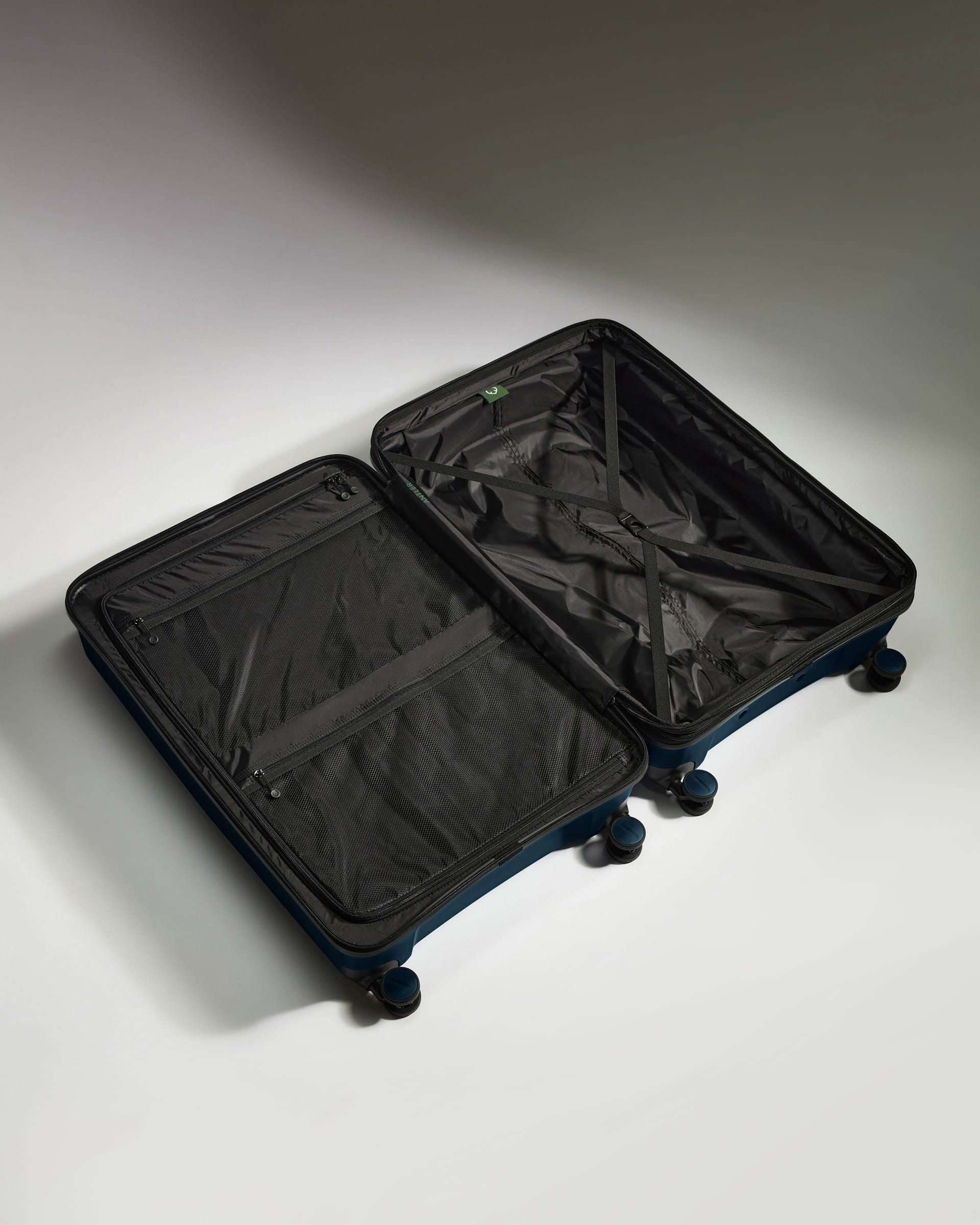 Antler Luggage -  Large Suitcase in Midnight Blue - Logo Stripe - Hard Suitcase - Large Large Suitcase Midnight Blue - Logo Stripe | Lightweight Hard Shell Luggage