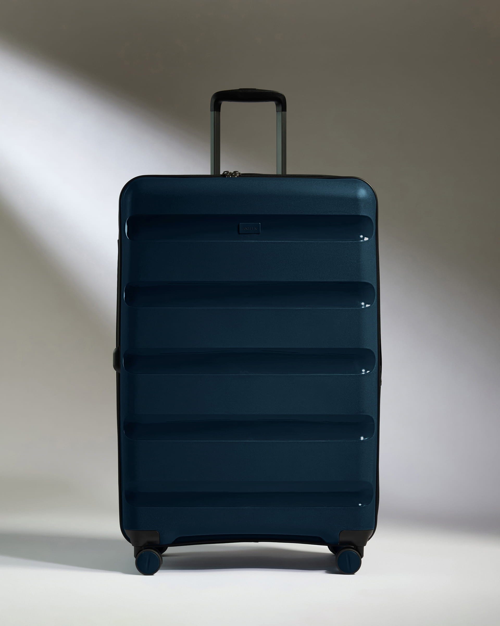 Antler Luggage -  Large Suitcase in Midnight Blue - Logo Stripe - Hard Suitcase - Large Large Suitcase Midnight Blue - Logo Stripe | Lightweight Hard Shell Luggage