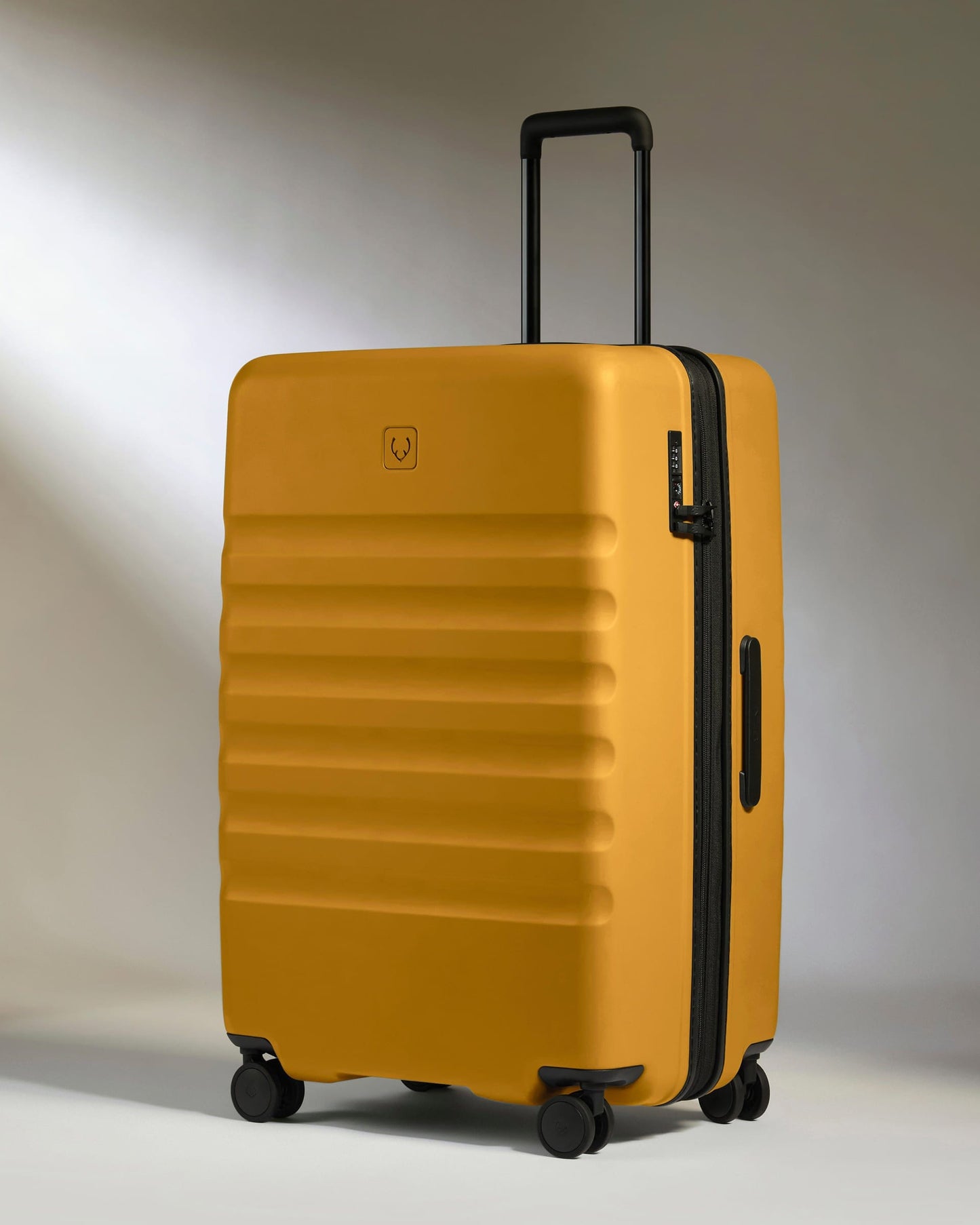 Antler Luggage -  Large Suitcase in Mustard Yellow - Icon Stripe - Hard Suitcase - Large Icon Stripe Large Suitcase in Dark Yellow | Lightweight & Hard Shell Suitcase