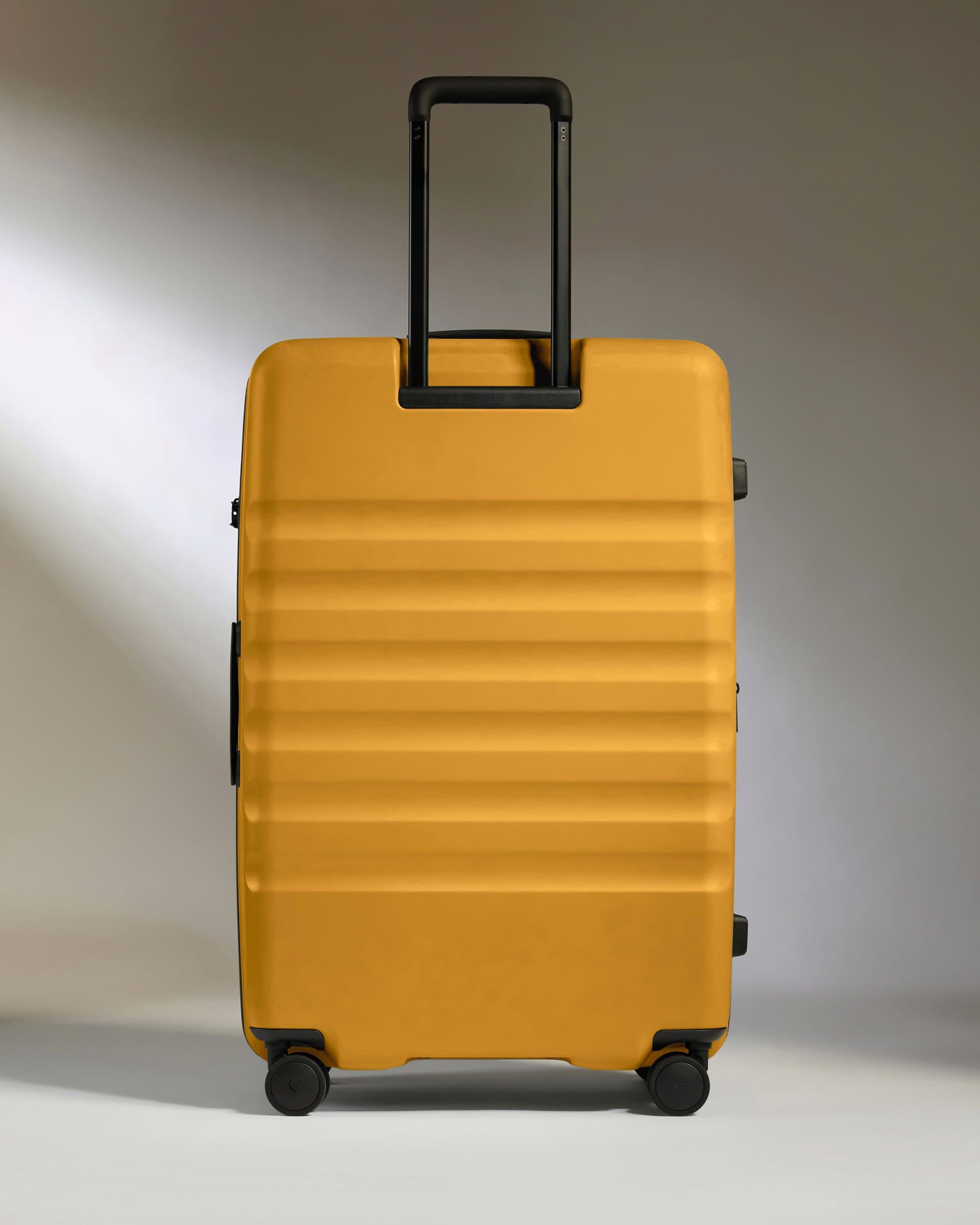 Antler Luggage -  Large Suitcase in Mustard Yellow - Icon Stripe - Hard Suitcase - Large Icon Stripe Large Suitcase in Dark Yellow | Lightweight & Hard Shell Suitcase
