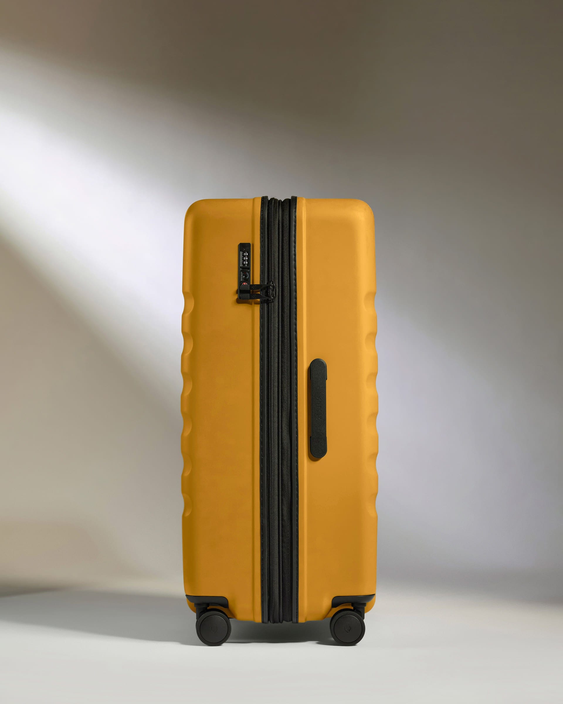 Antler Luggage -  Large Suitcase in Mustard Yellow - Icon Stripe - Hard Suitcase - Large Icon Stripe Large Suitcase in Dark Yellow | Lightweight & Hard Shell Suitcase