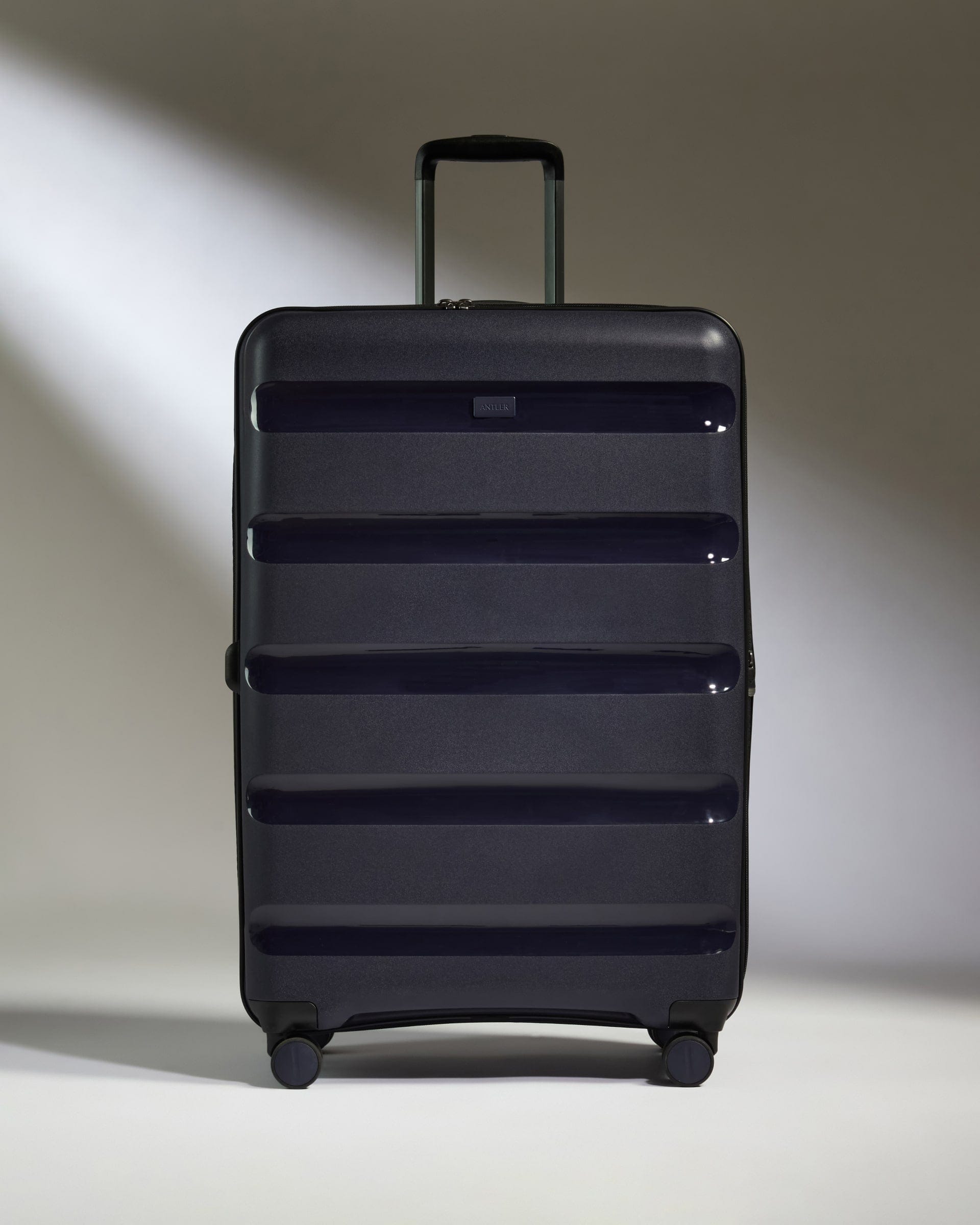 Antler Luggage -  Large Suitcase in Navy - Logo Stripe - Hard Suitcase - Large Large Suitcase Navy - Logo Stripe | Lightweight Hard Shell Luggage