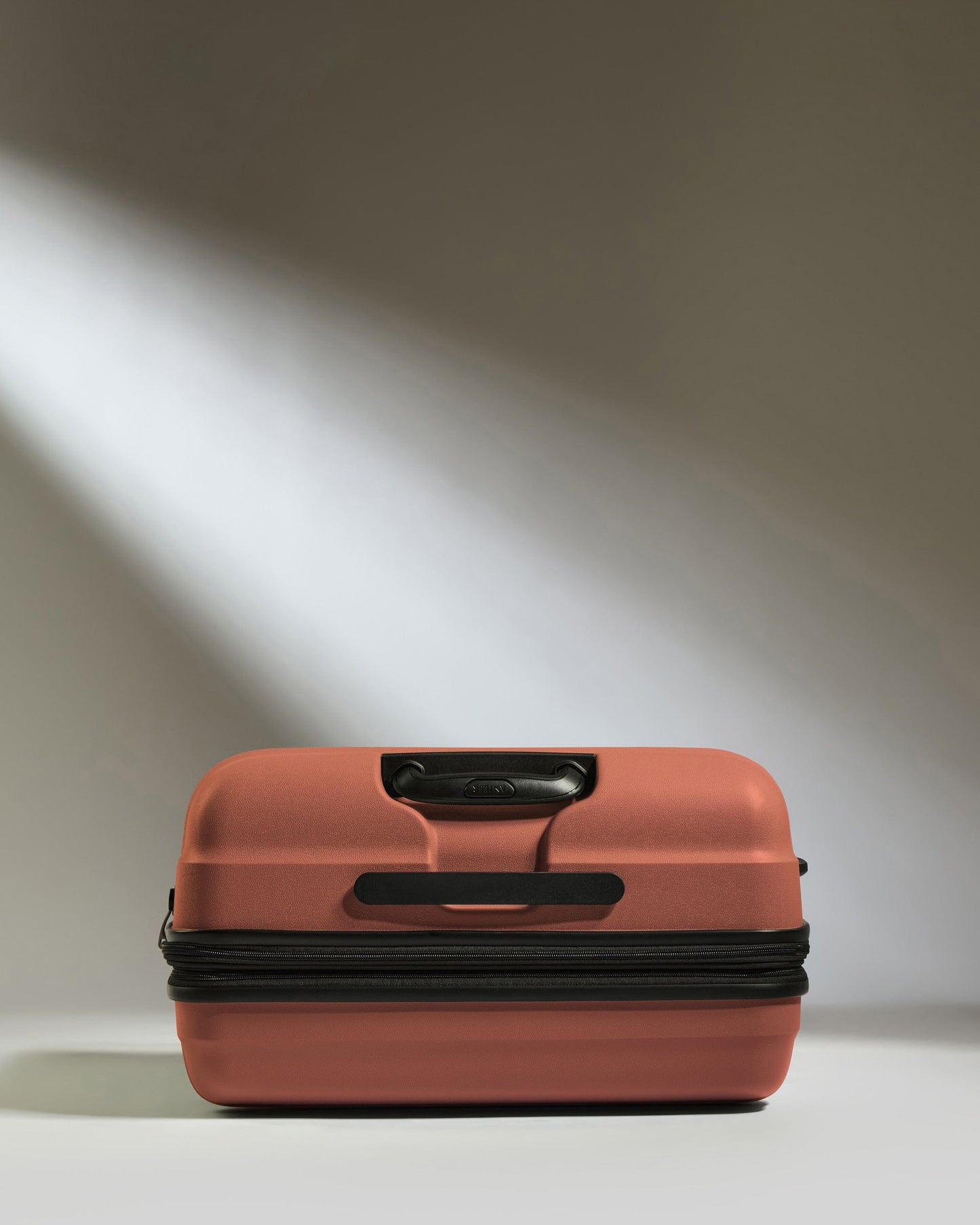 Antler Luggage -  Large Suitcase in Soft Orange - Juno - Hard Suitcase Large Suitcase in Soft Orange - Juno | Checked Luggage & Large Suitcases