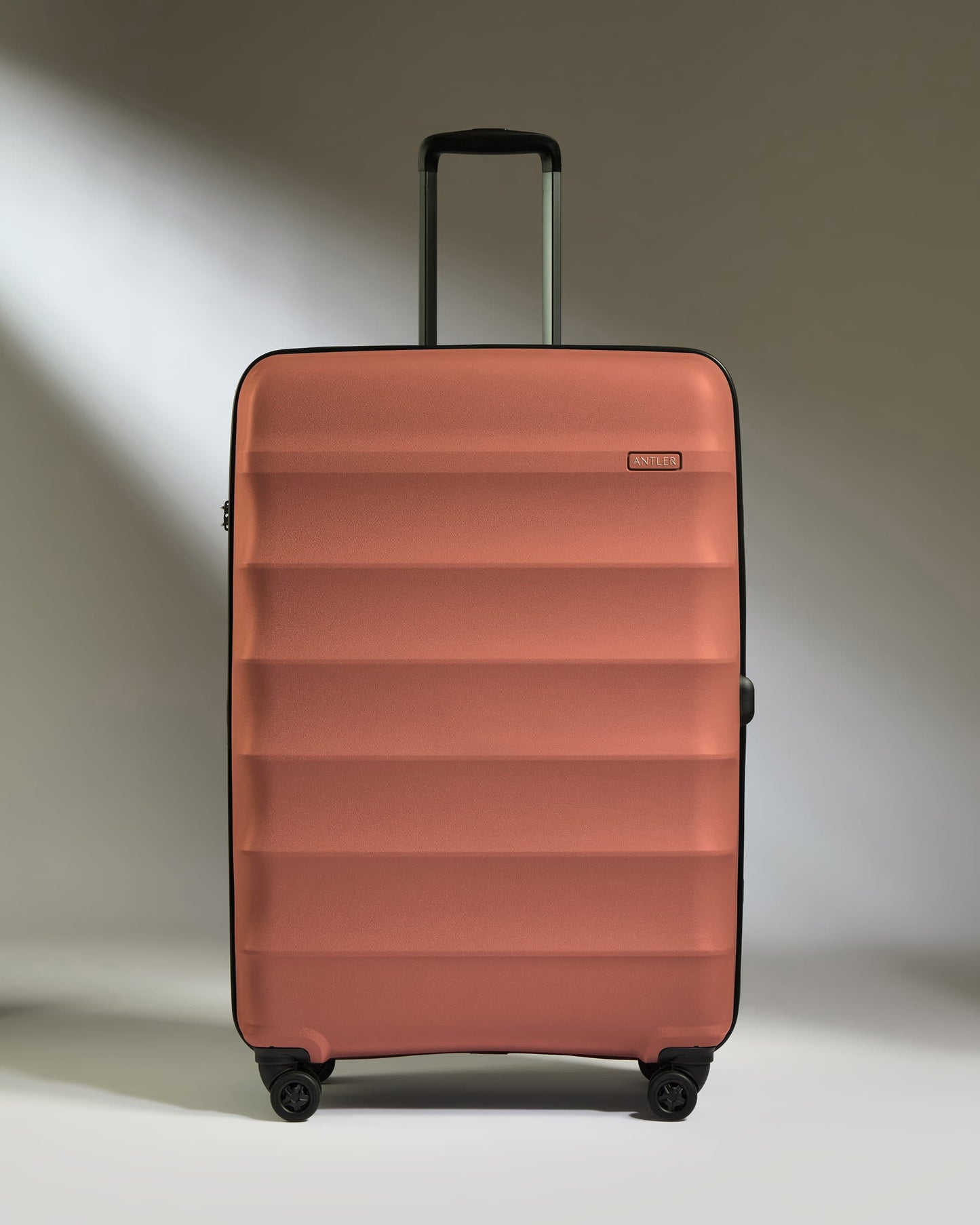 Antler Luggage -  Large Suitcase in Soft Orange - Juno - Hard Suitcase Large Suitcase in Soft Orange - Juno | Checked Luggage & Large Suitcases
