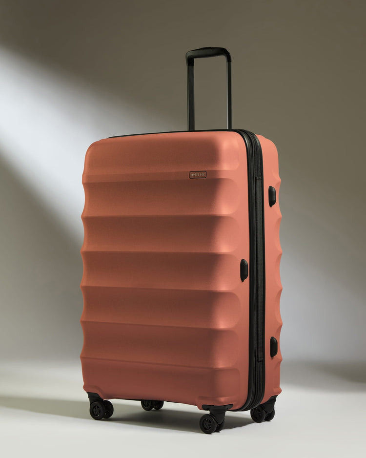Antler Luggage -  Large Suitcase in Soft Orange - Juno - Hard Suitcase Large Suitcase in Soft Orange - Juno | Checked Luggage & Large Suitcases