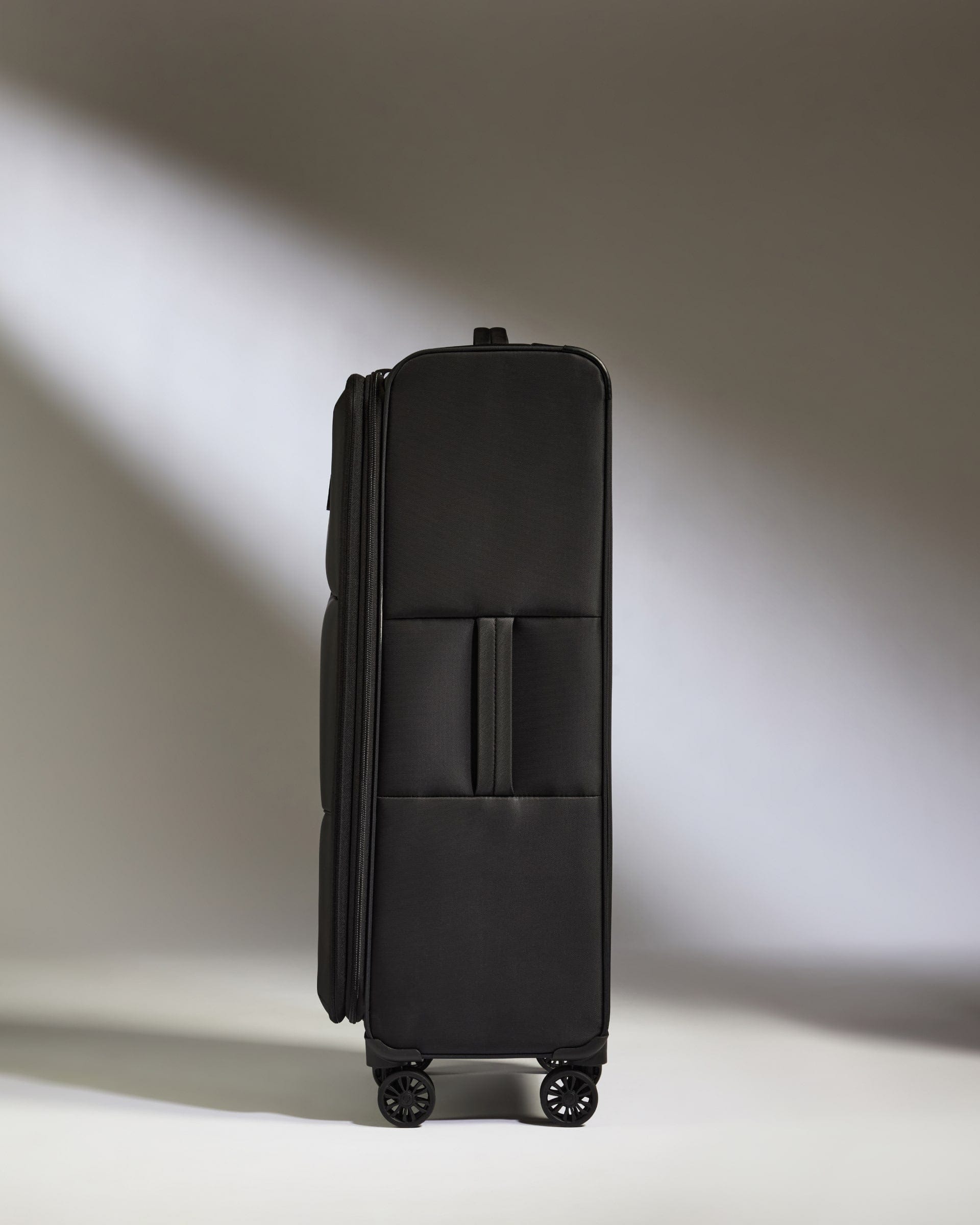 Antler Luggage -  Lightest Large Suitcase in Black - Soft Stripe 2.0 - Soft Suitcase Lightest Large Suitcase in Black - Soft Stripe 2.0 | Soft Checked Suitcase