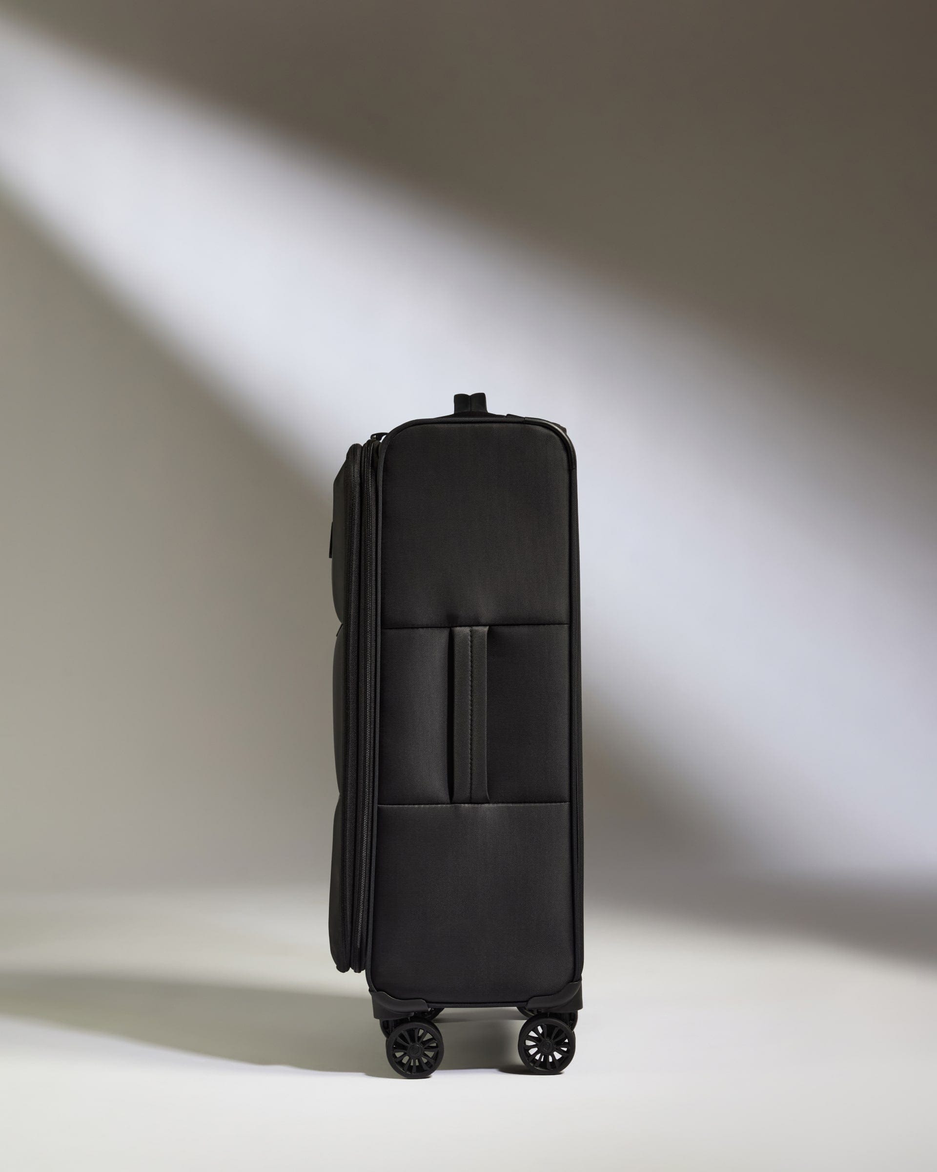 Antler Luggage -  Lightest Medium Suitcase in Black - Soft Stripe 2.0 - Soft Suitcase Lightest Medium Suitcase in Black - Soft Stripe 2.0 | Soft Suitcase